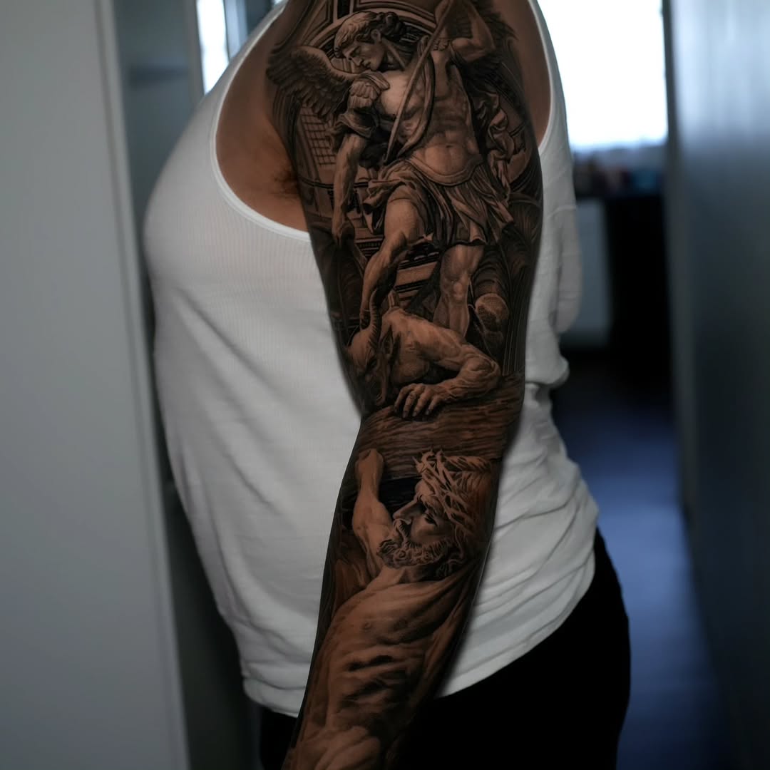 Tattoo by @vik_tattoos — realism, black_and_grey