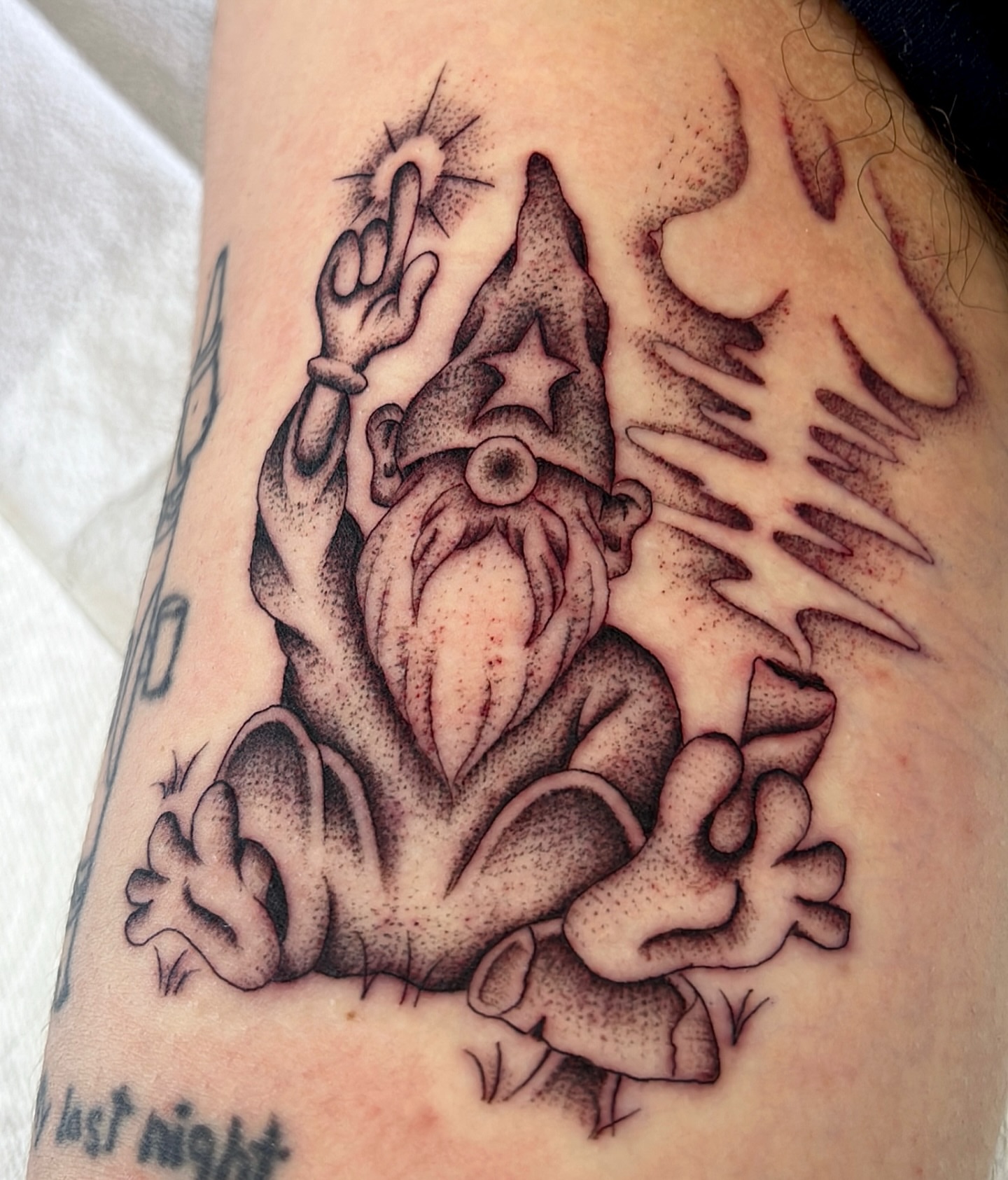 Gnome dotwork tattoo on the forearm by David Delacruz