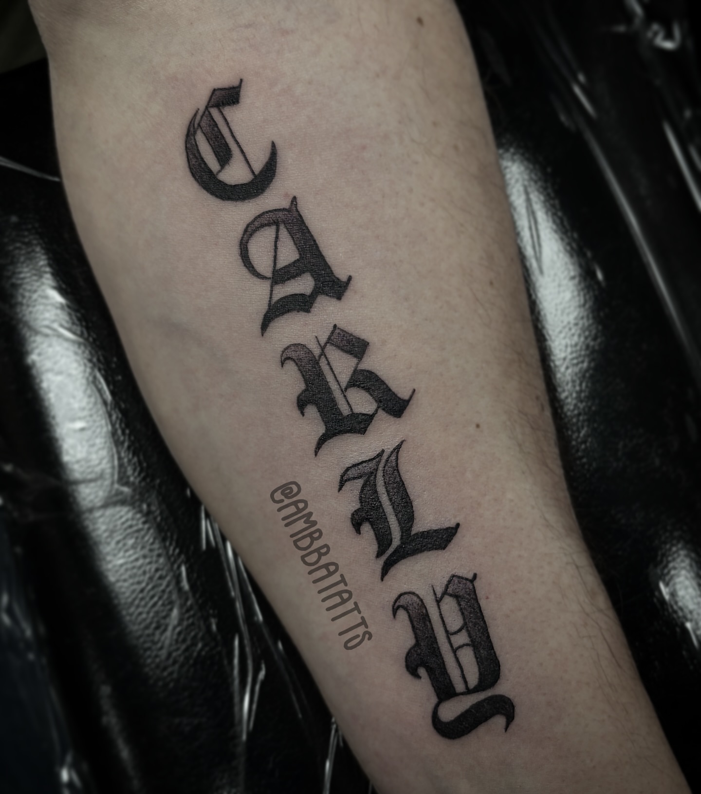 Name lettering script tattoo on the forearm by amber brady, Brunswick, Ohio
