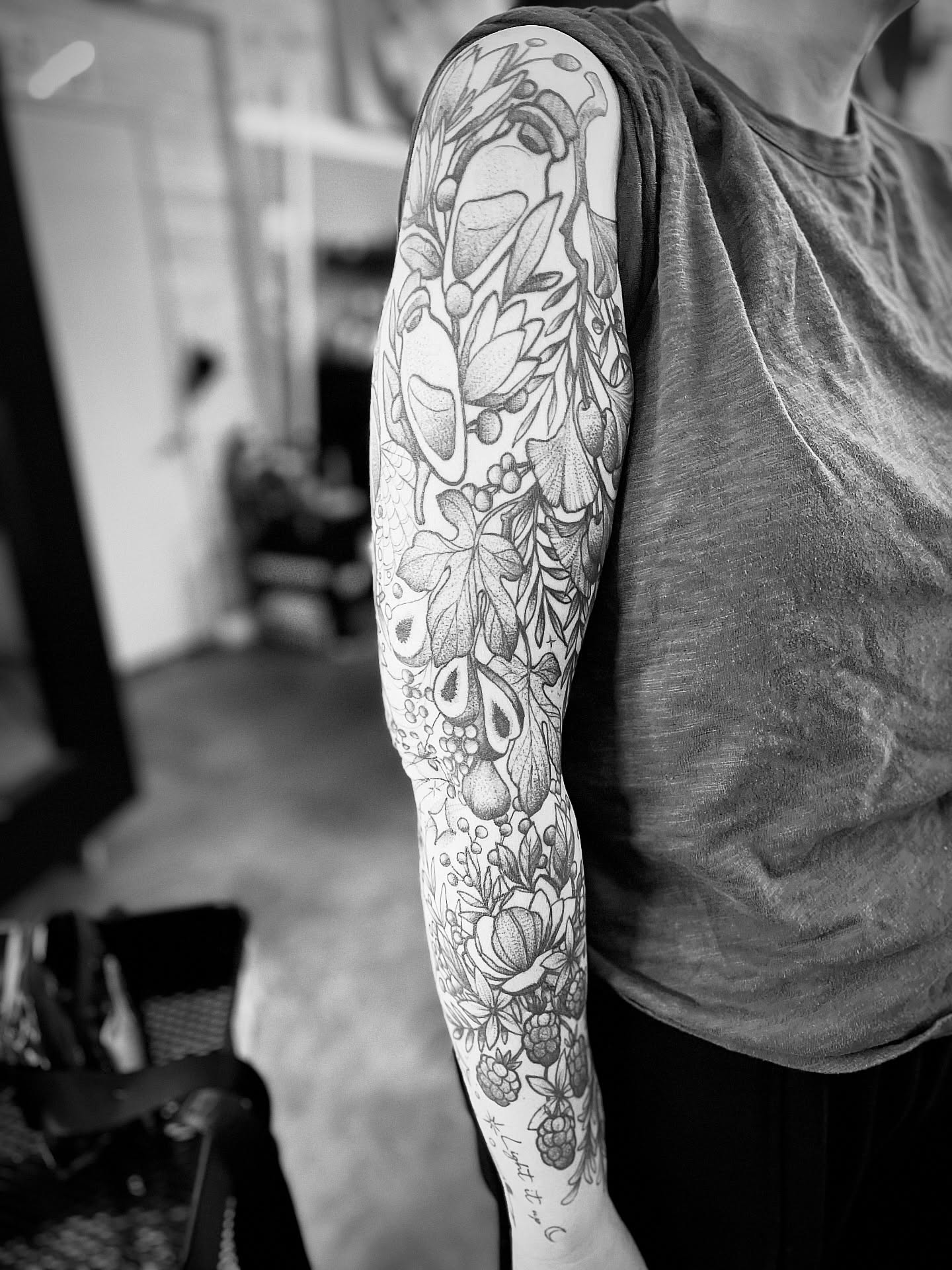 Floral arrangement dotwork tattoo on the forearm by Alex Santaloci