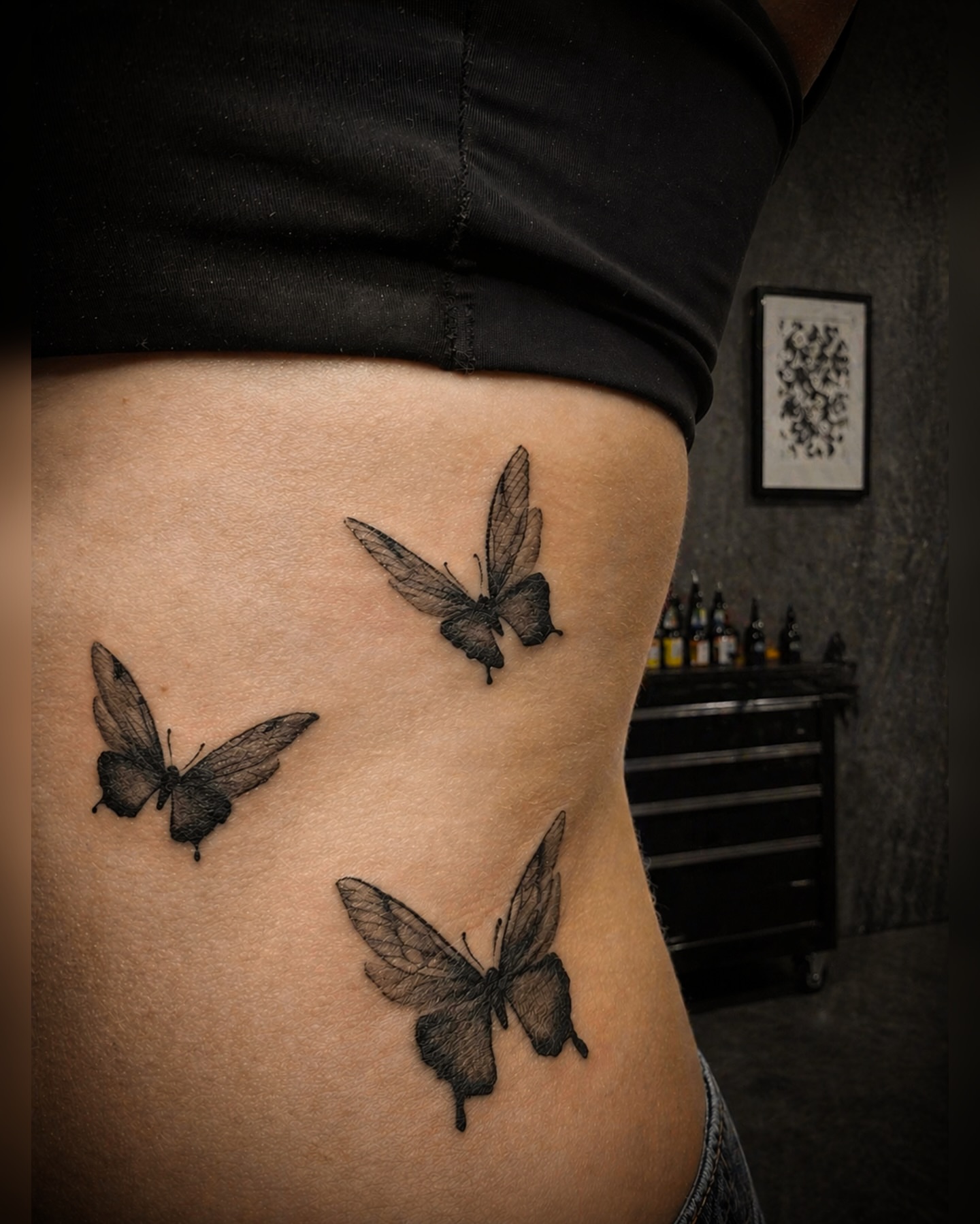 Butterflies black and grey tattoo on the ribs by Sacramento tattoo