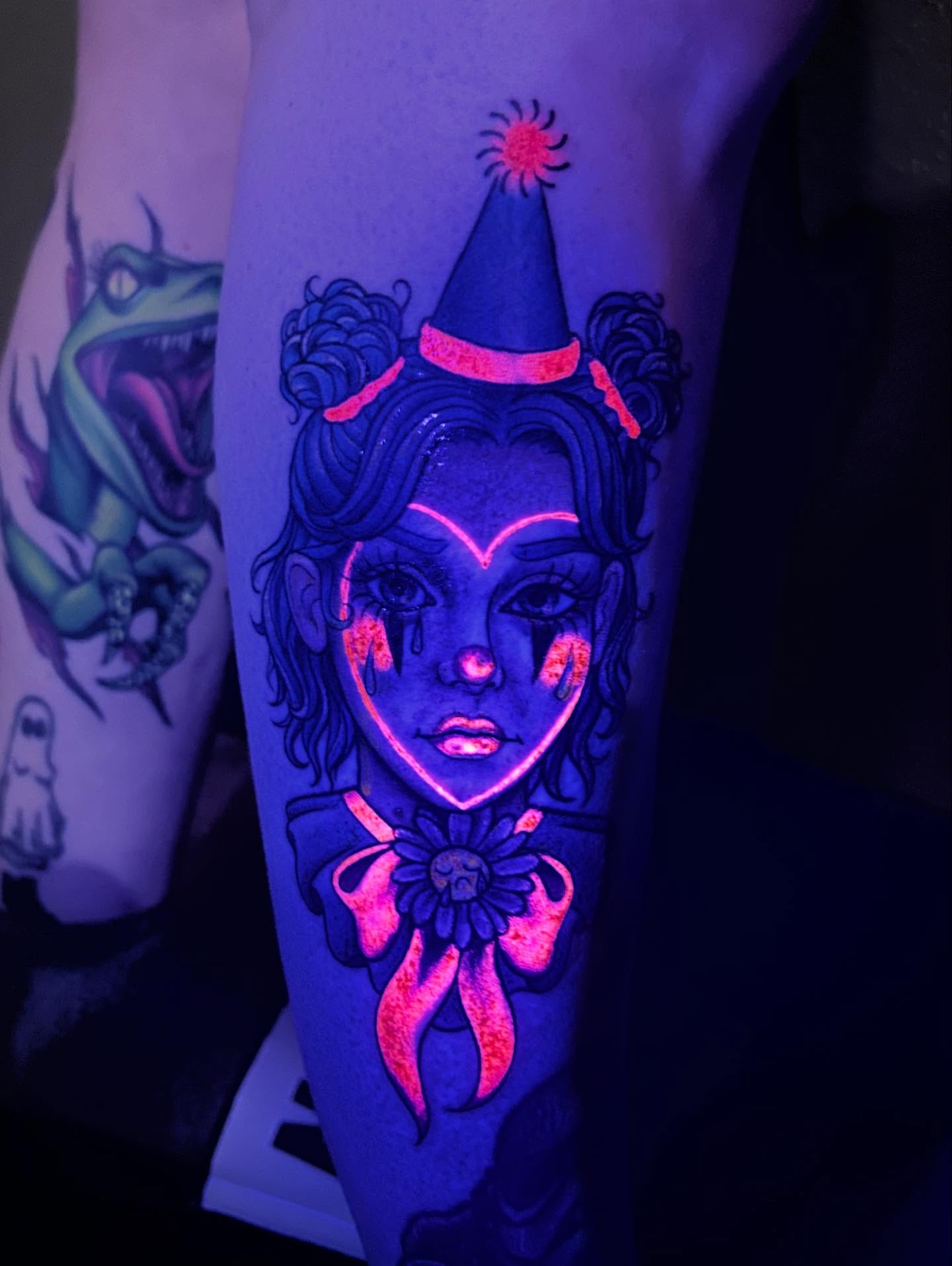 Clown girl new school tattoo on the forearm by Mary Rose Heckle