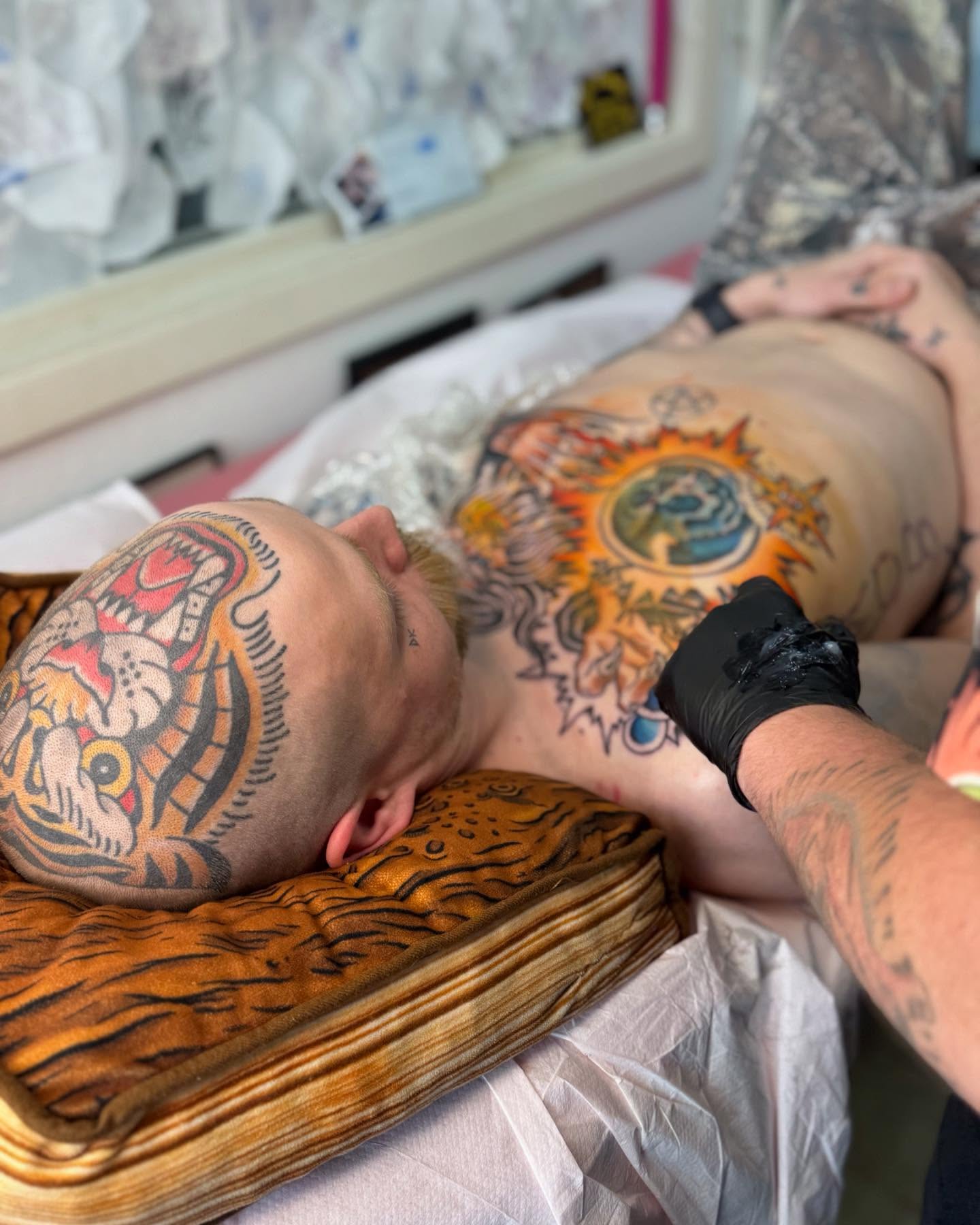 Sun and face American traditional tattoo on the back by Leo 🌞 Pdx Tattoo