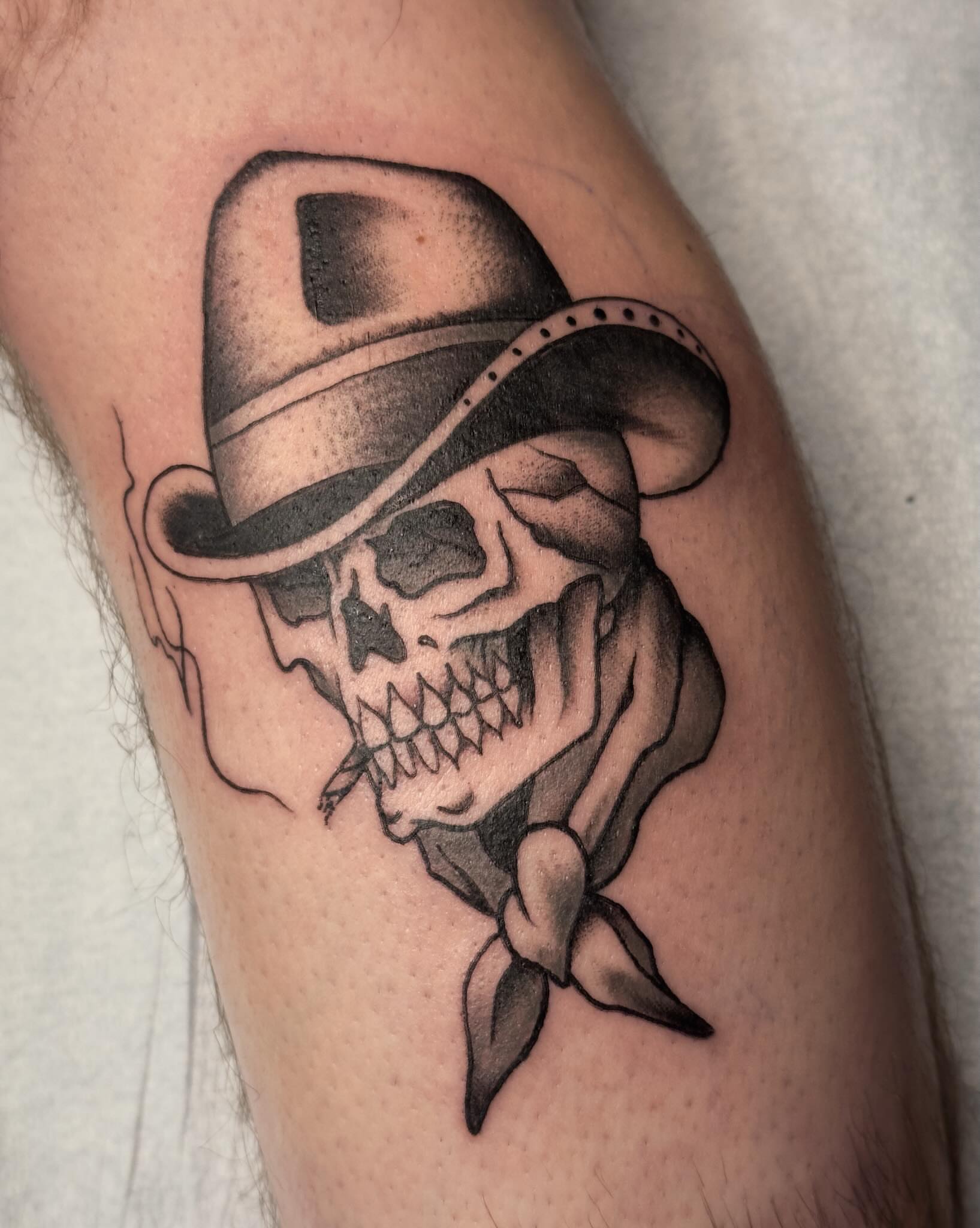 Cowboy skull realism tattoo on the forearm by Craig Ryans
