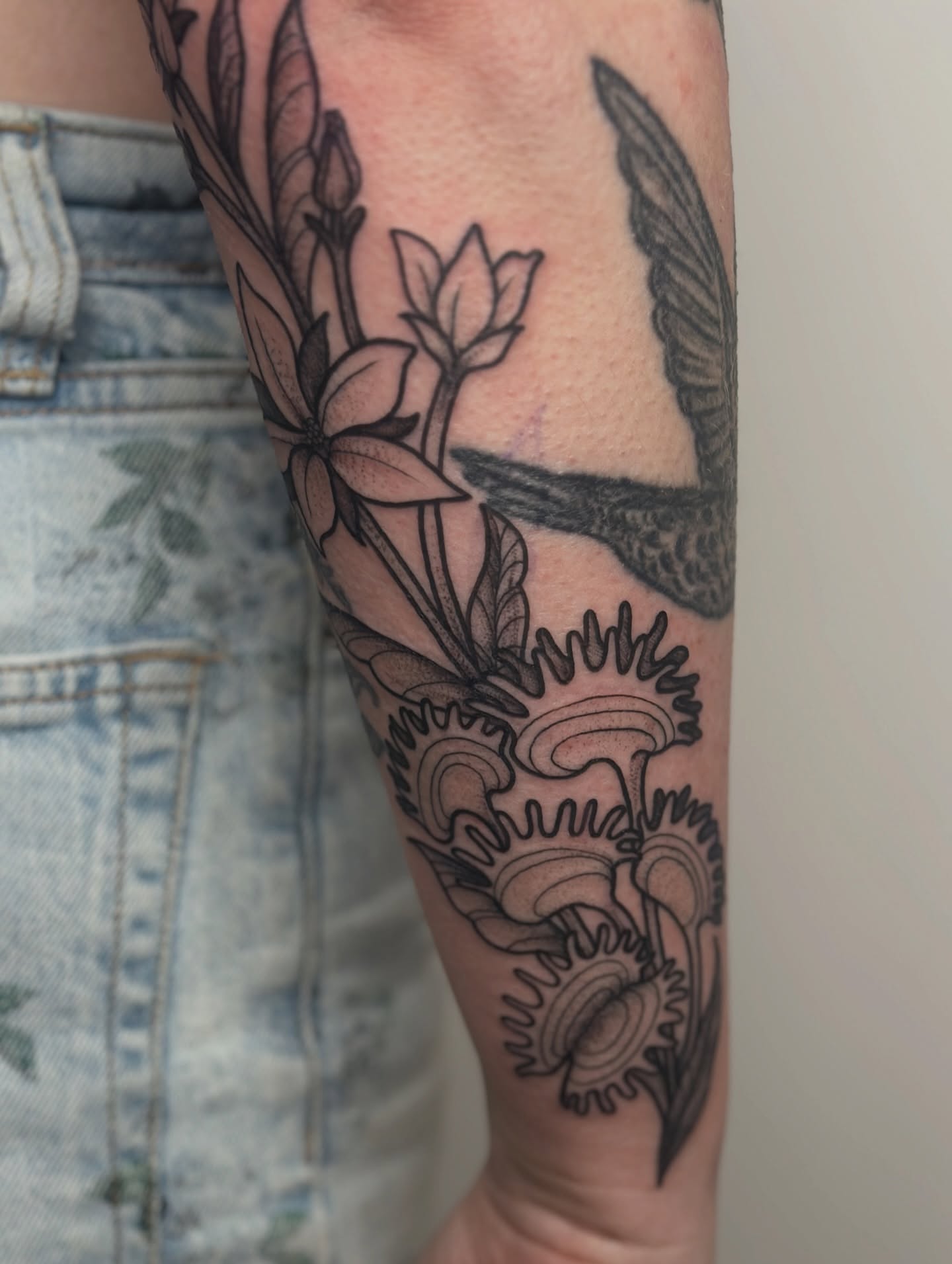 Bird and flowers black and grey tattoo on the forearm by Gabrielle Brodman 🎀 Raleigh-Durham Tattoo