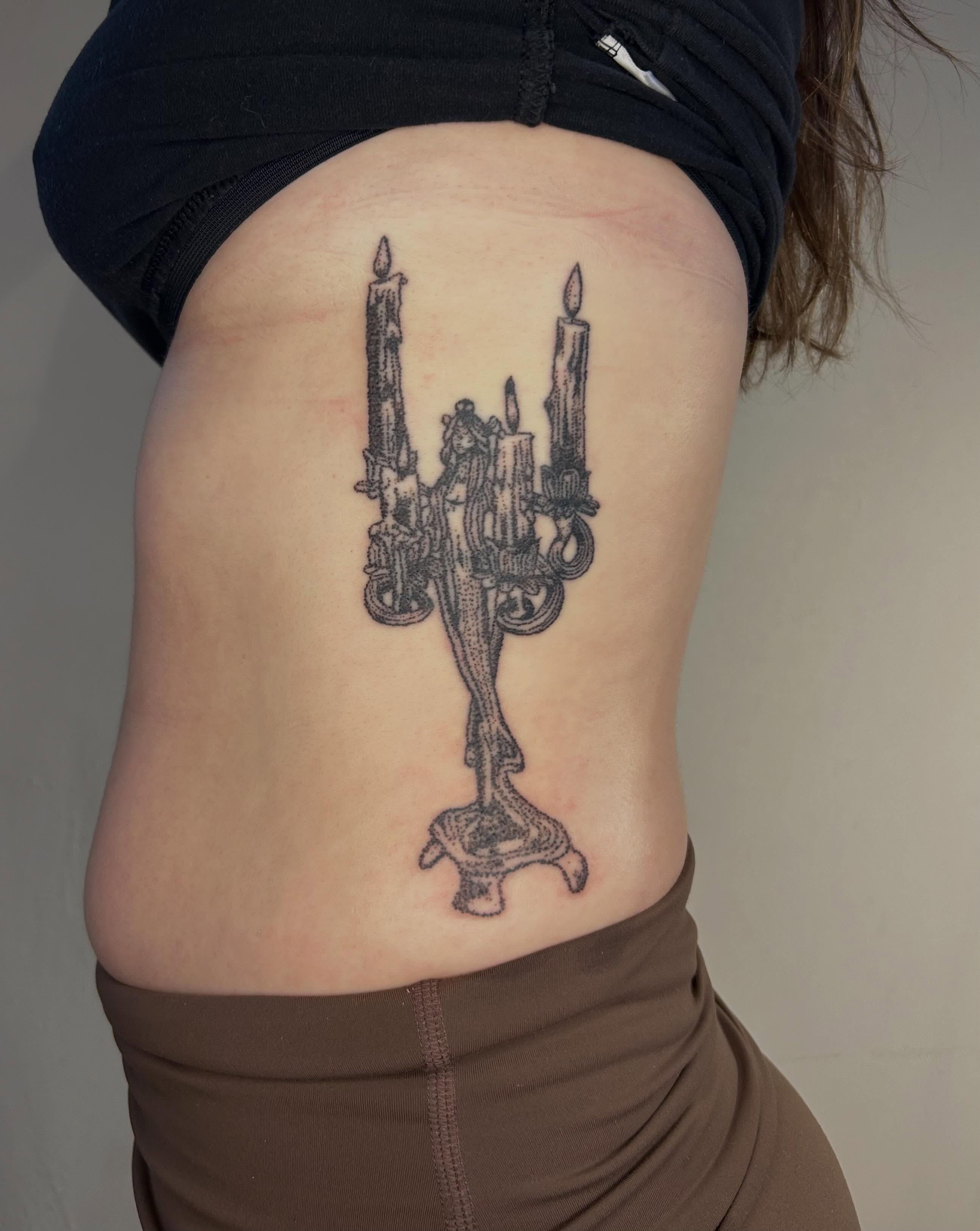 Candelabra black and grey tattoo on the ribs by ˙⋆✮⋆˙‧₊˚✧ sophie ✧˚₊‧˙⋆✮⋆˙