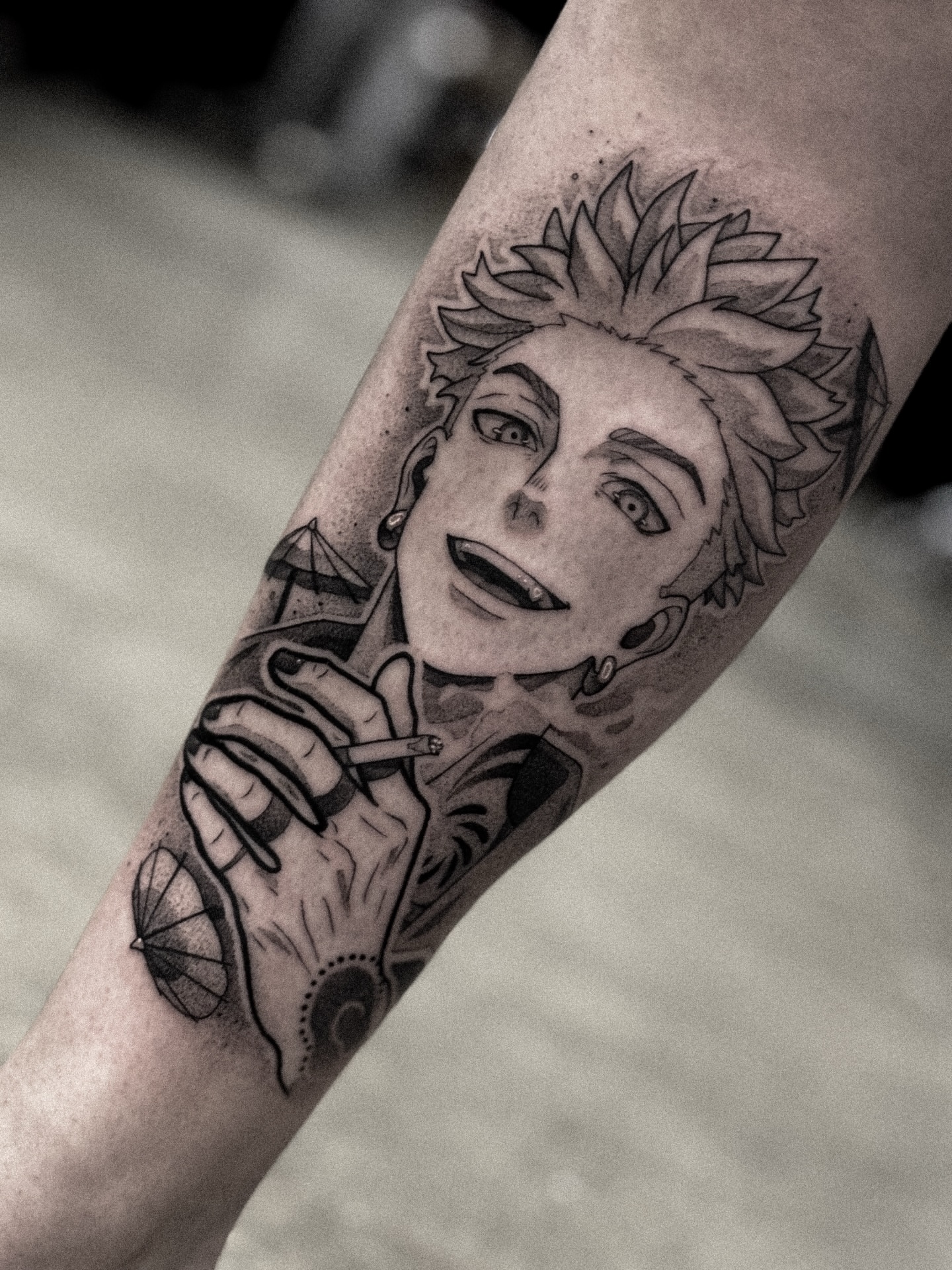 Anime character anime tattoo on the forearm by Dane Bezeau