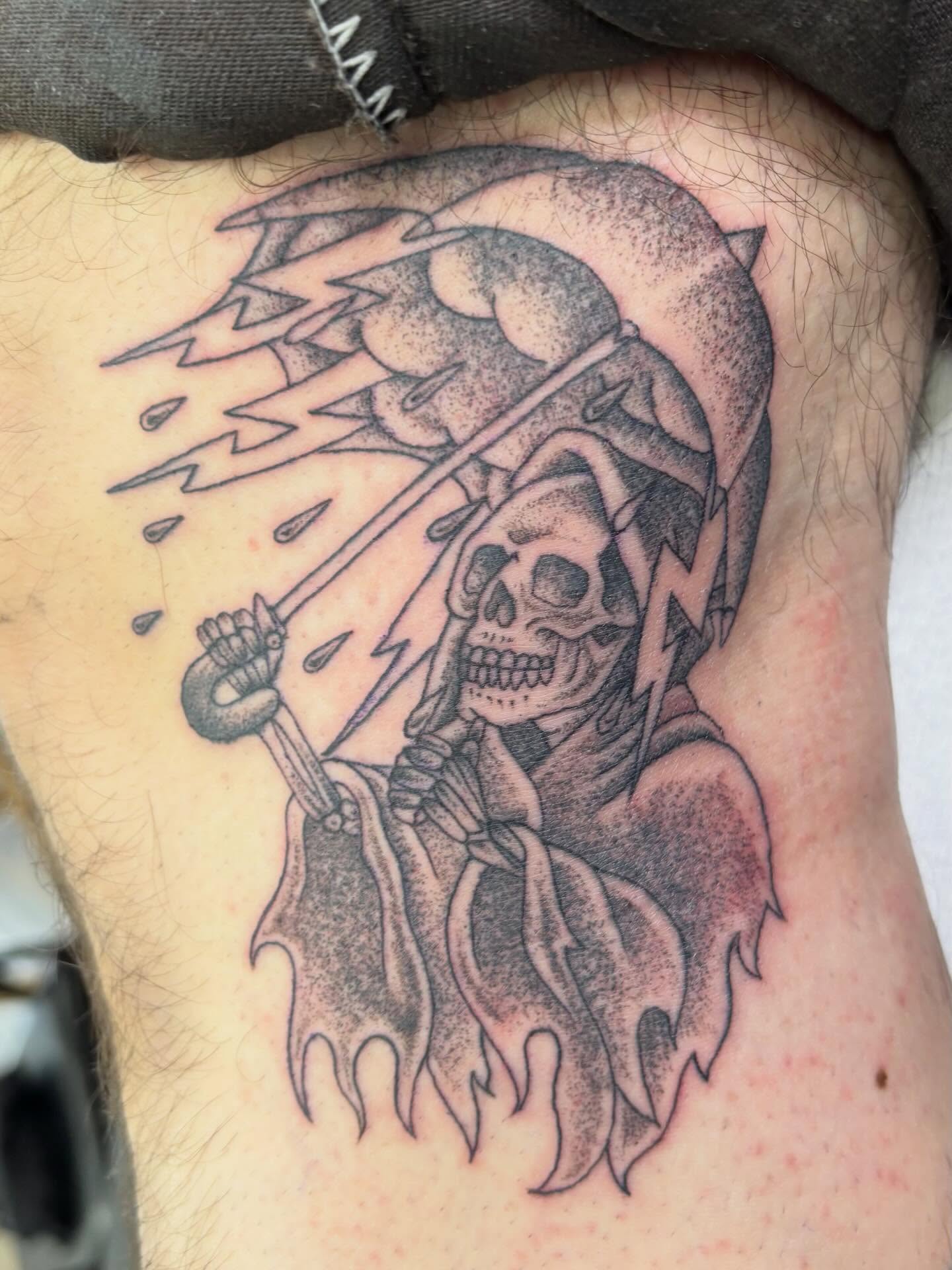 Grim reaper black and grey tattoo on the thigh by Jay