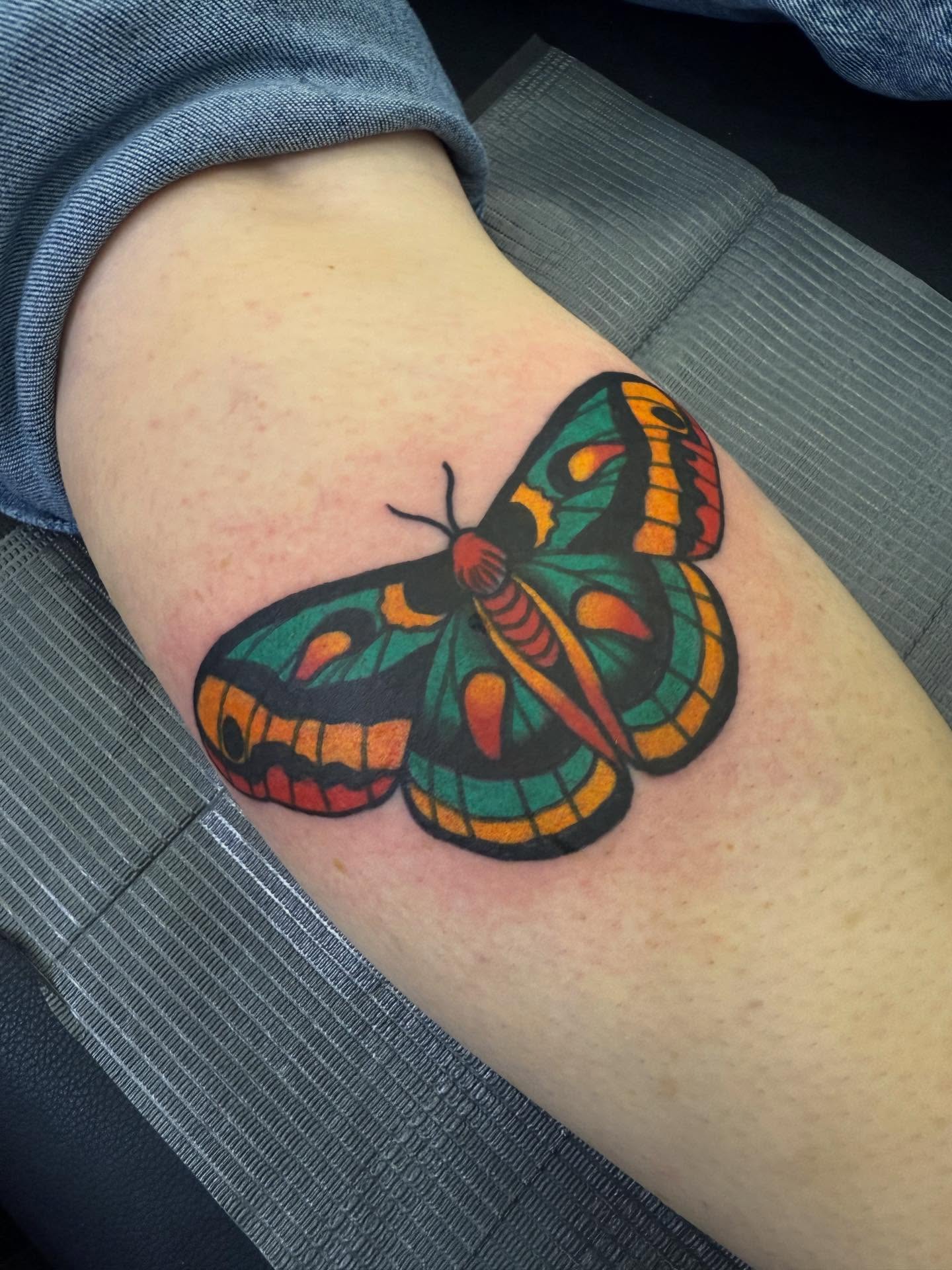 Butterfly American traditional tattoo on the forearm by Randall Croley El