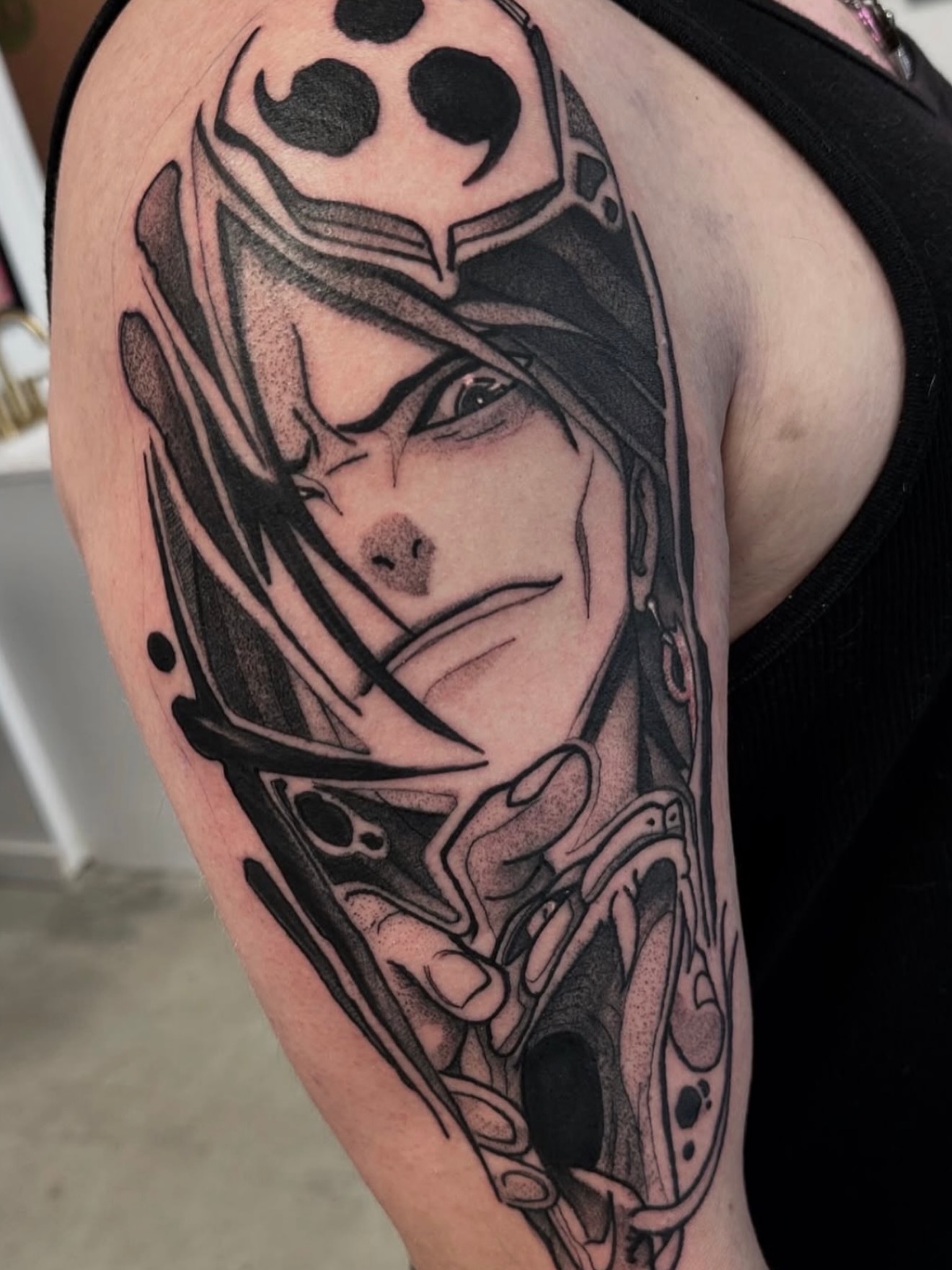 Anime character anime tattoo on the shoulder by Christopher Layman