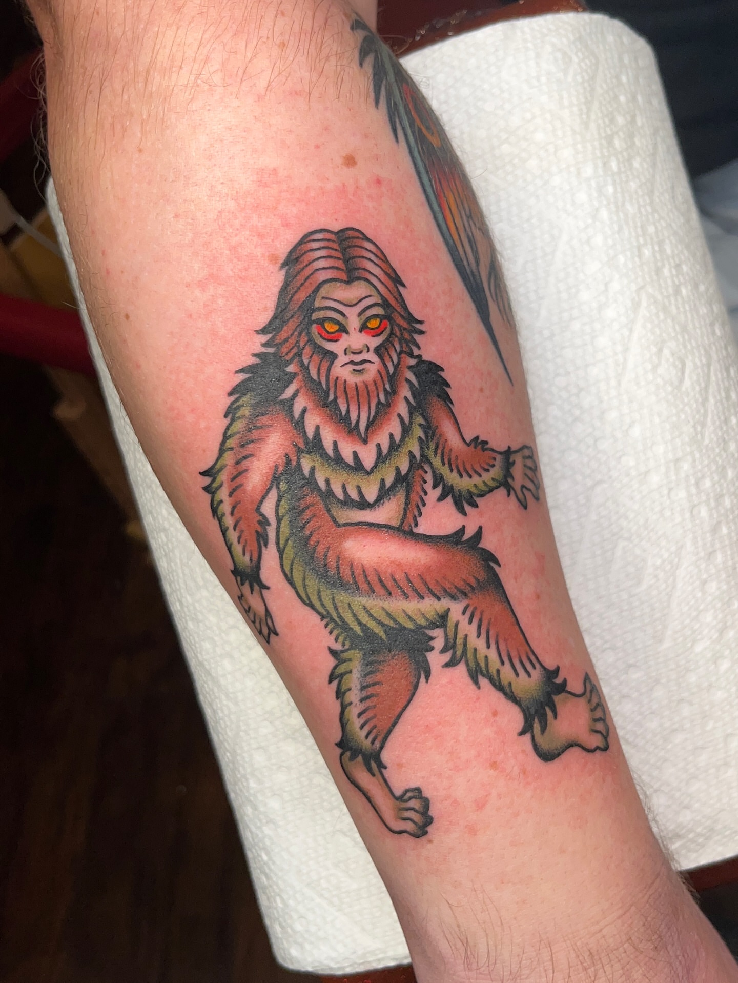 Bigfoot American traditional tattoo on the forearm by Nat Power