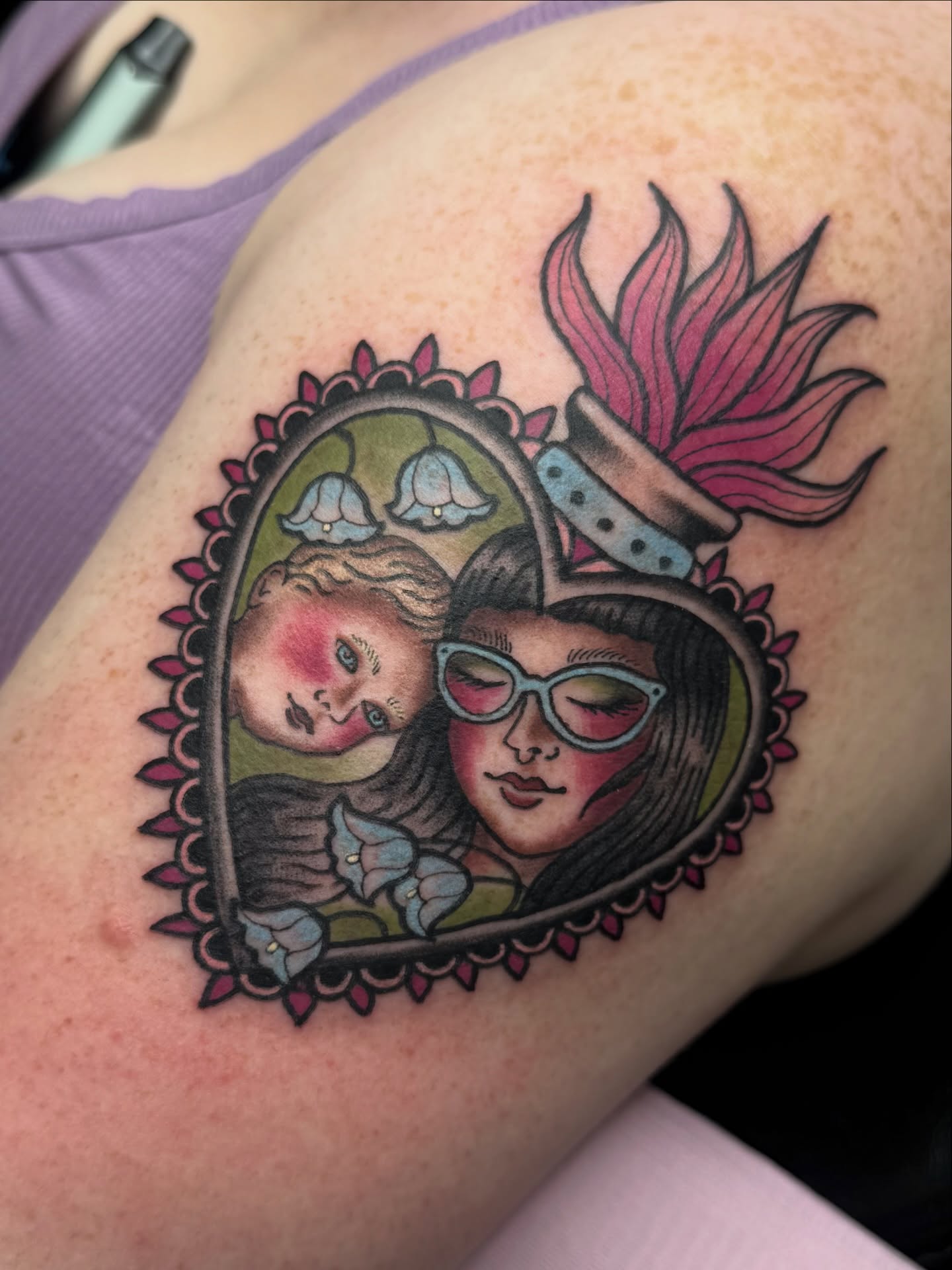 Doll and woman American traditional tattoo on the shoulder by Chloe Marie