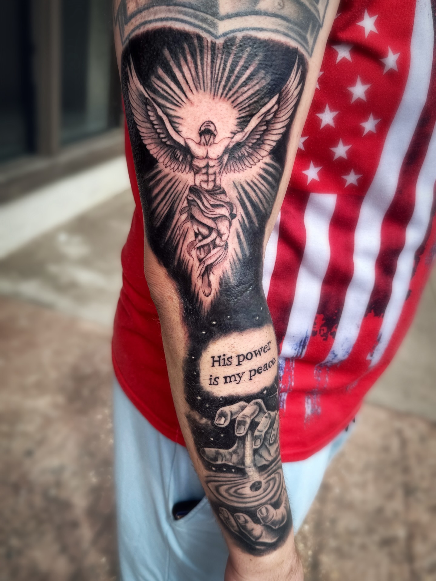 Angelic figure realism tattoo on the forearm by Kate