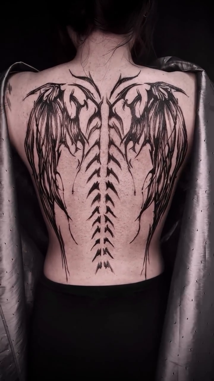 Tattoo by @dowoo_tattoo — blackwork, ornamental