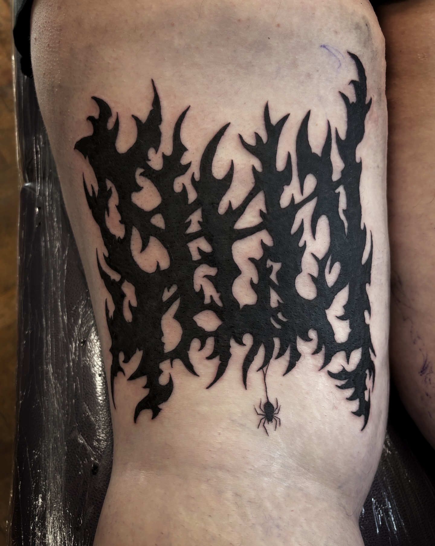 Tattoo by @scorchedbones_ — black_and_grey
