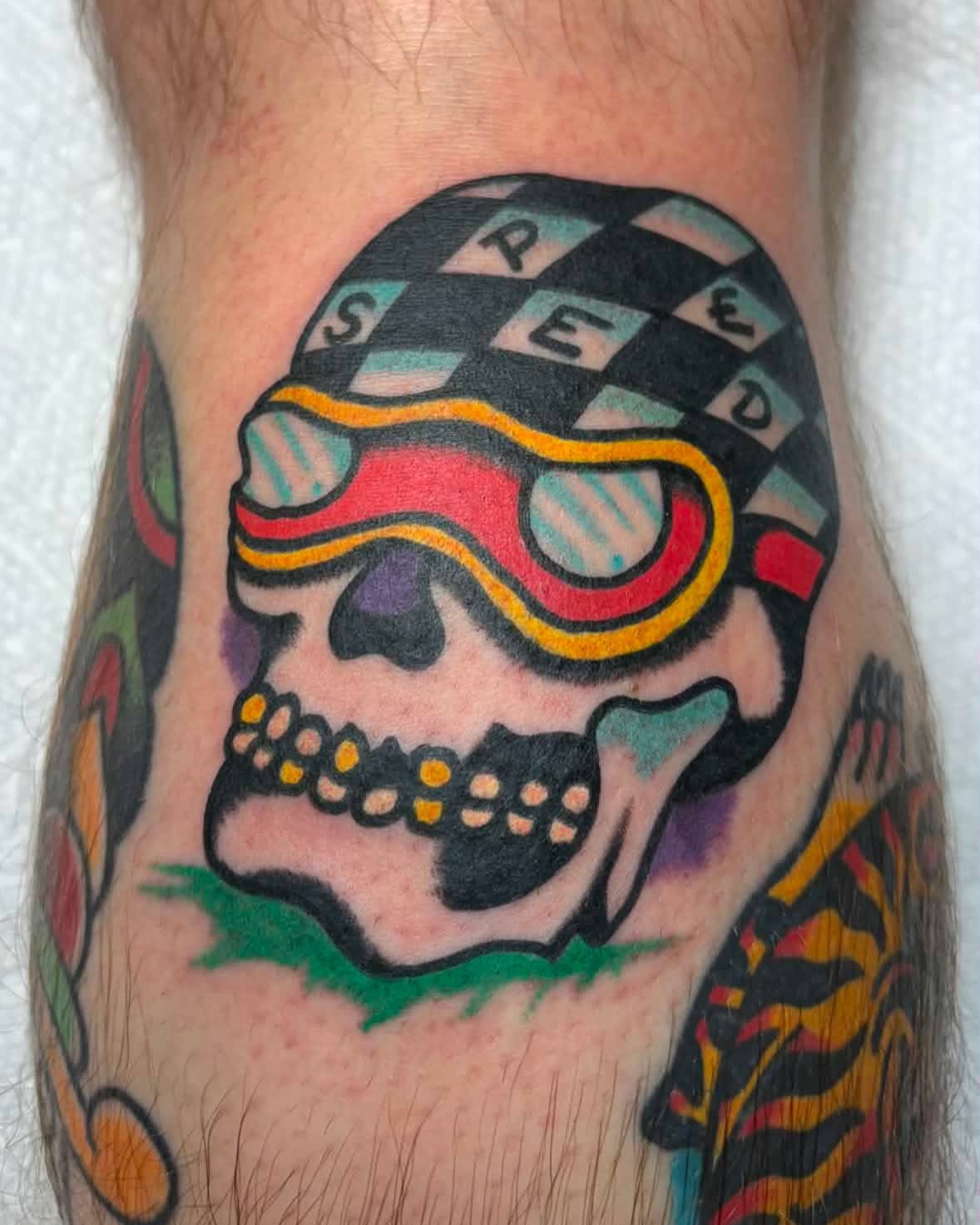 Skull with goggles American traditional tattoo on the forearm by Jake Herbert, Knoxville, Tennessee