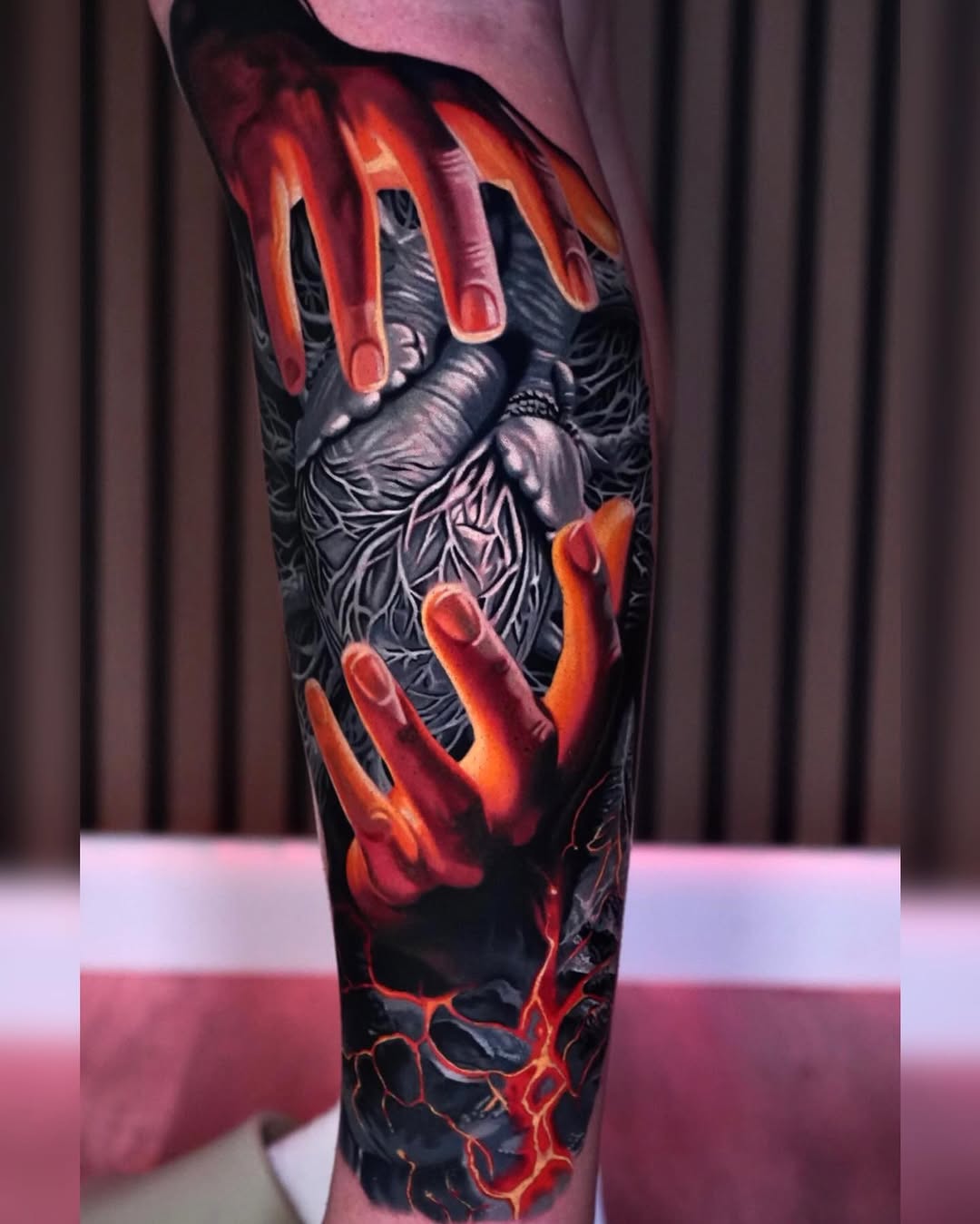 Surrealism tattoo on the forearm by Sadier Alfonso