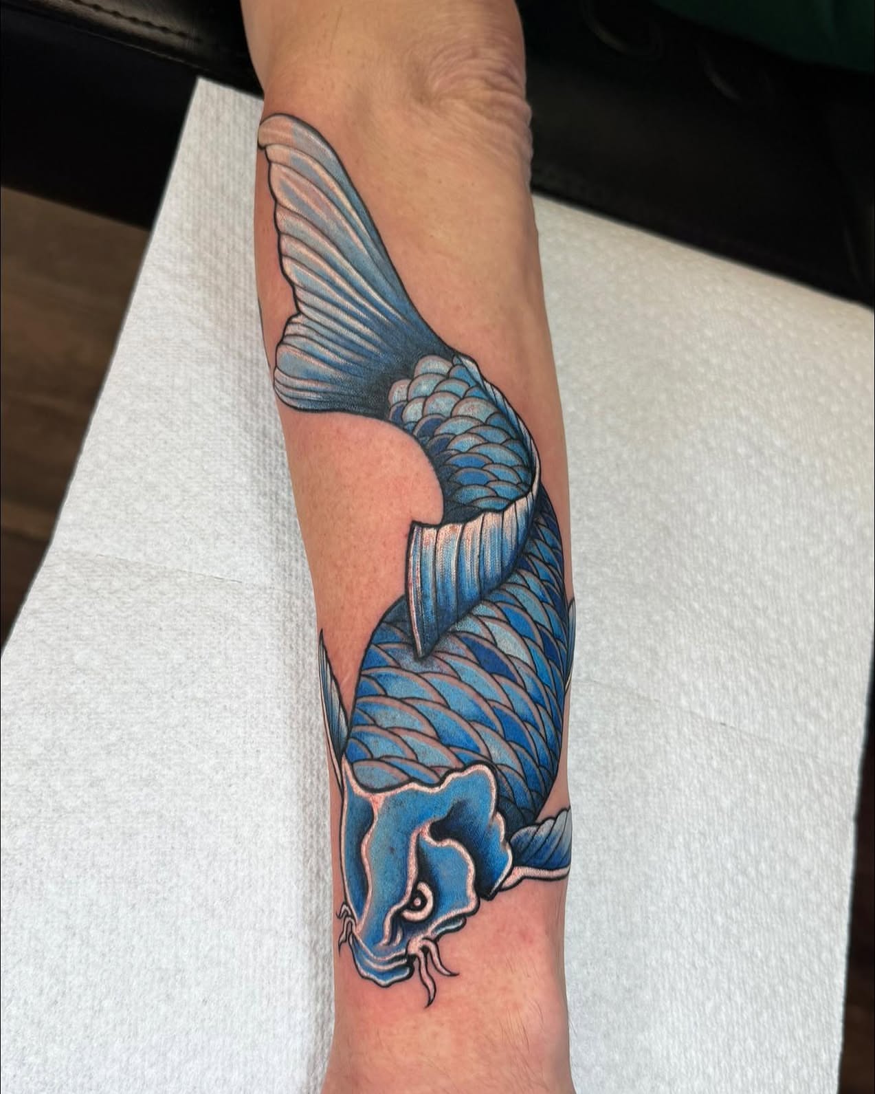Koi fish japanese irezumi tattoo on the forearm by Chad Meado
