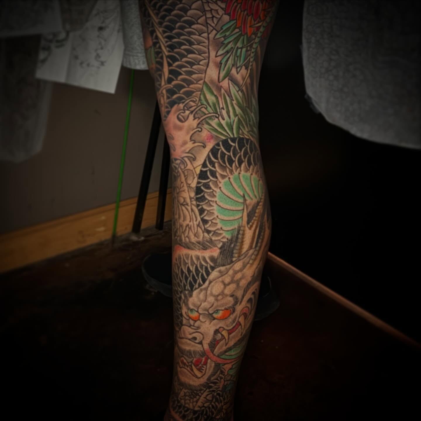 Dragon and pine tree japanese irezumi tattoo on the forearm by Mike Diamond