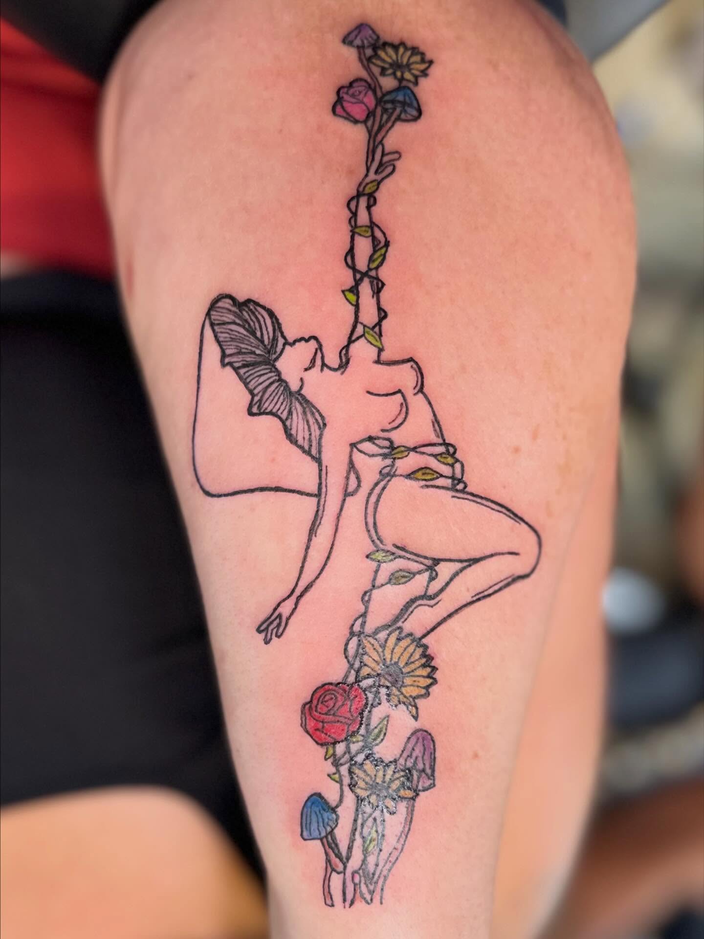 Ballerina with flowers new school tattoo on the thigh by Zen Forbes