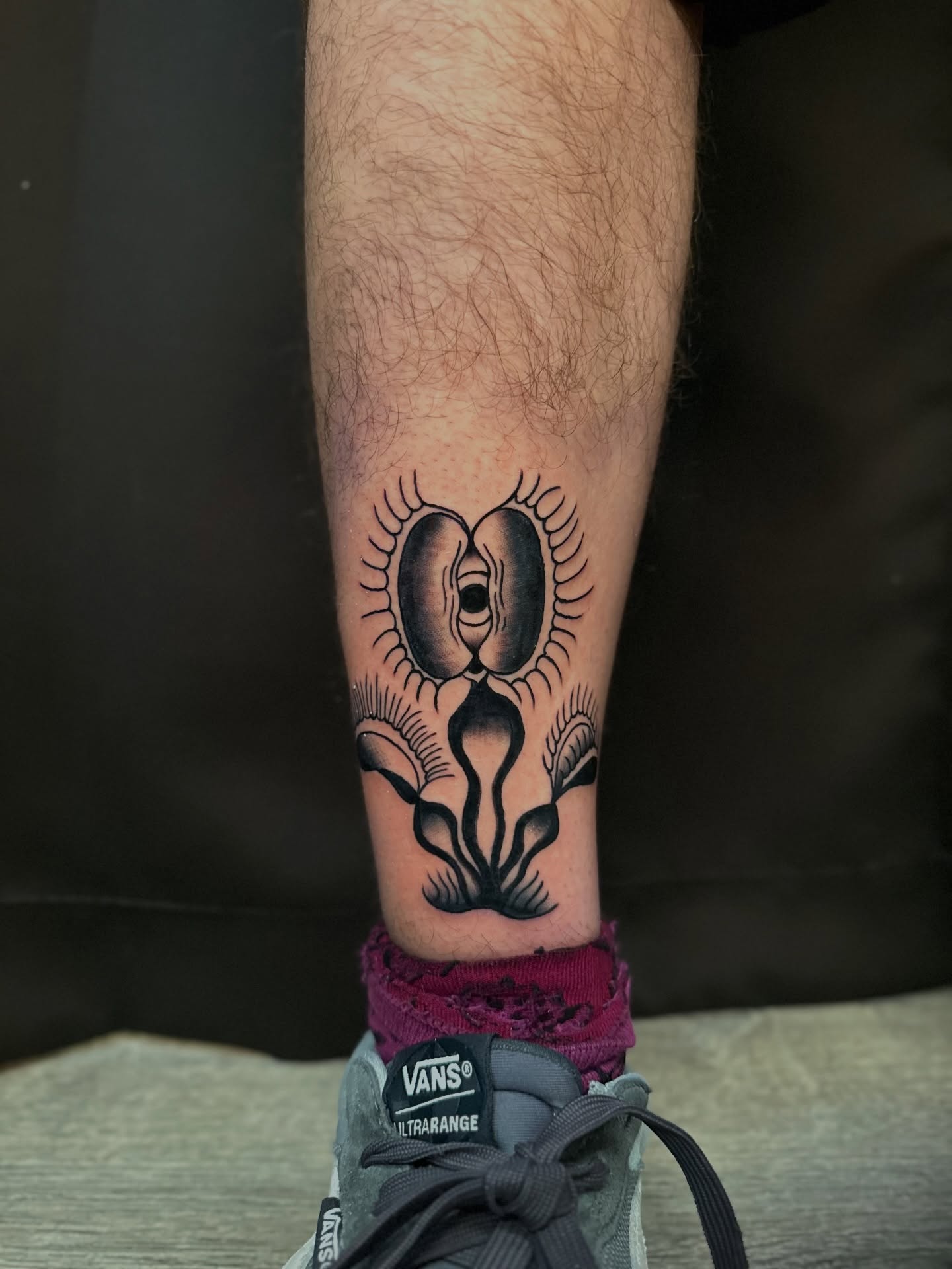 Eyes black and grey tattoo on the calf by Tyyler Santor (Tattoo Artist), Somerville, Massachusetts