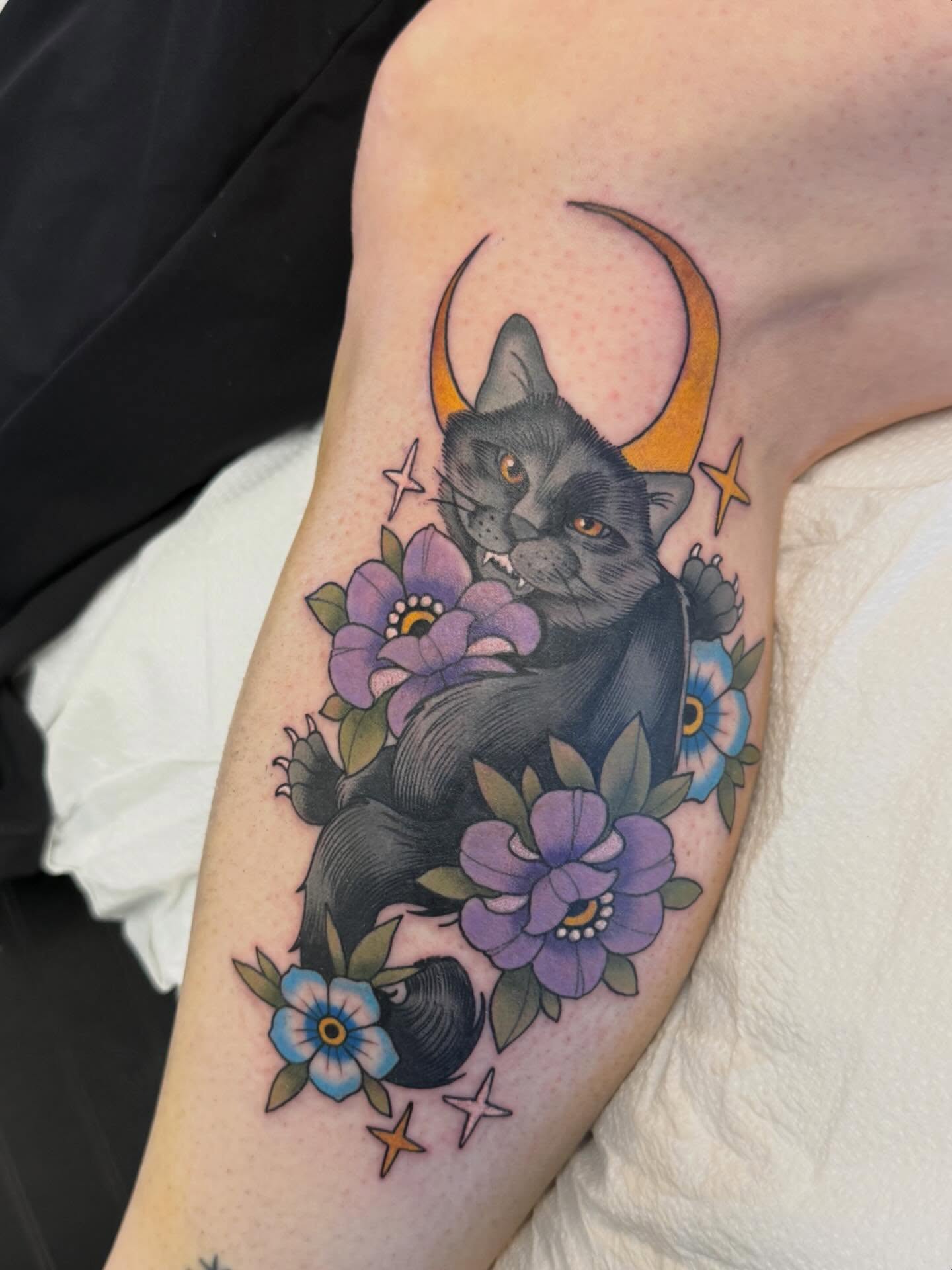 Cat and flowers new school tattoo on the forearm by Connie Fiorino - Tattoo Artist