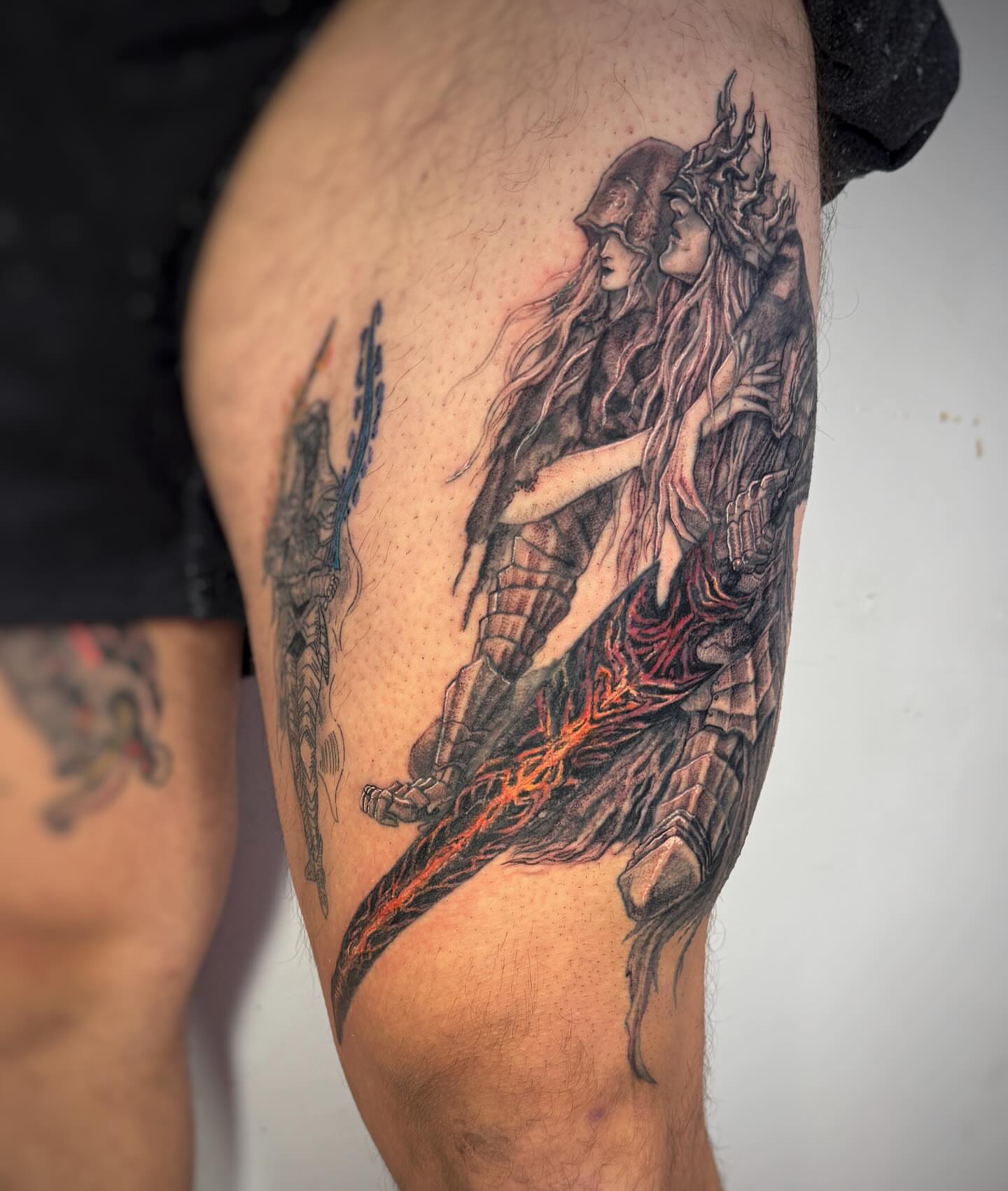 Demon couple dark realism tattoo on the thigh by Jemin Ren