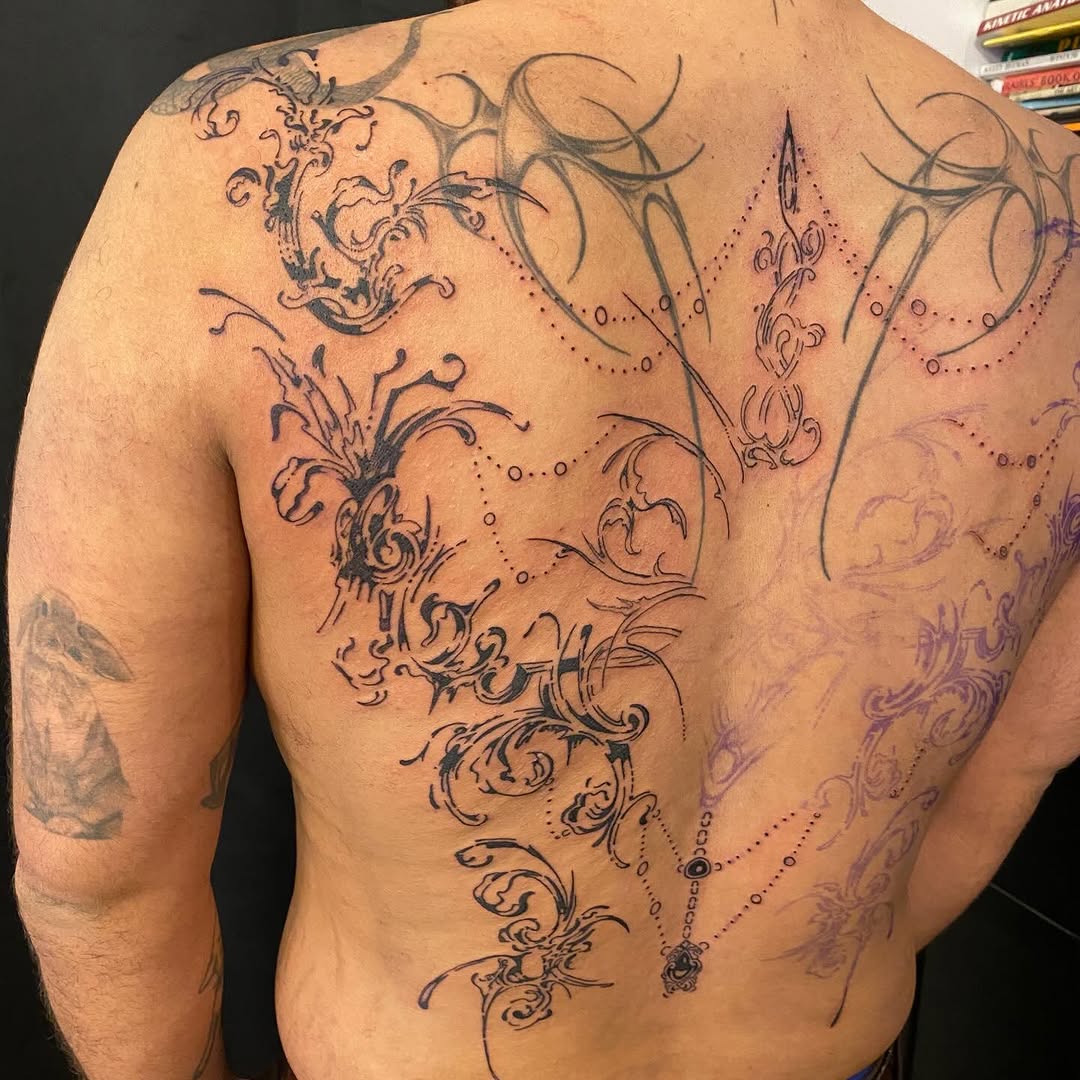 Tattoo by @woodniptat — ornamental, blackwork