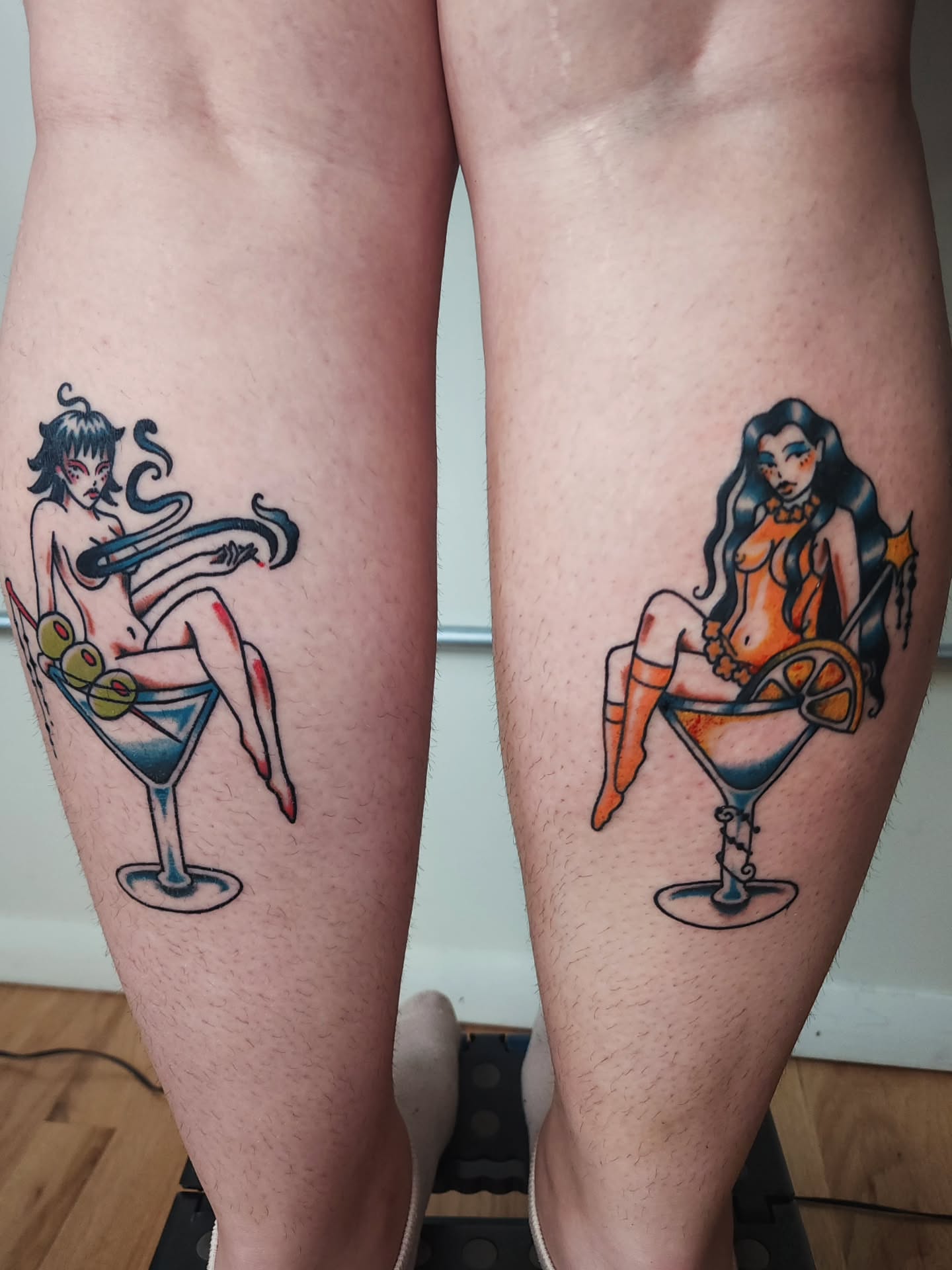 Martini girl anime tattoo on the thigh by Maxine Stewart