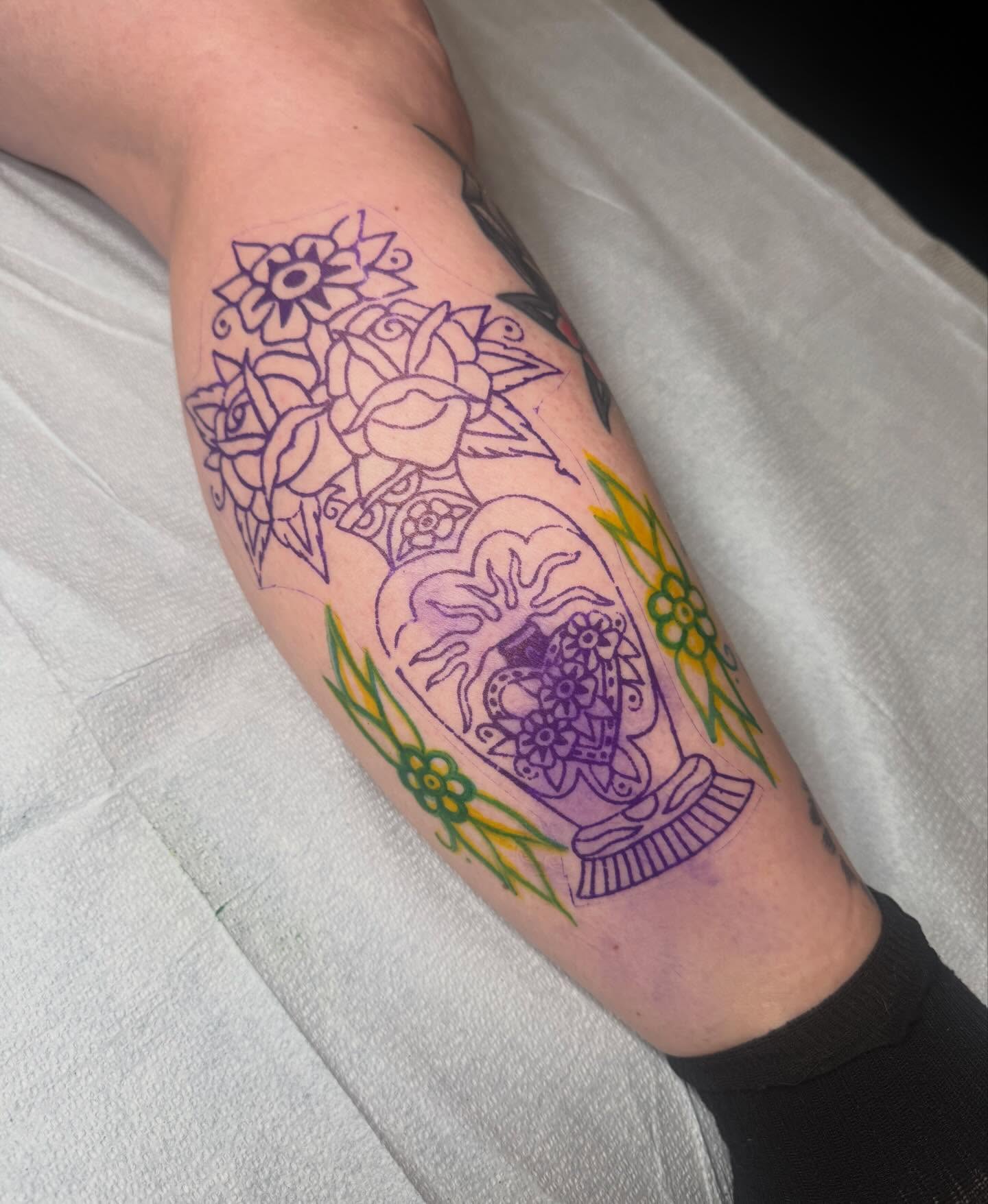 Sugar skull with floral elements American traditional tattoo on the forearm by JoJo Benton