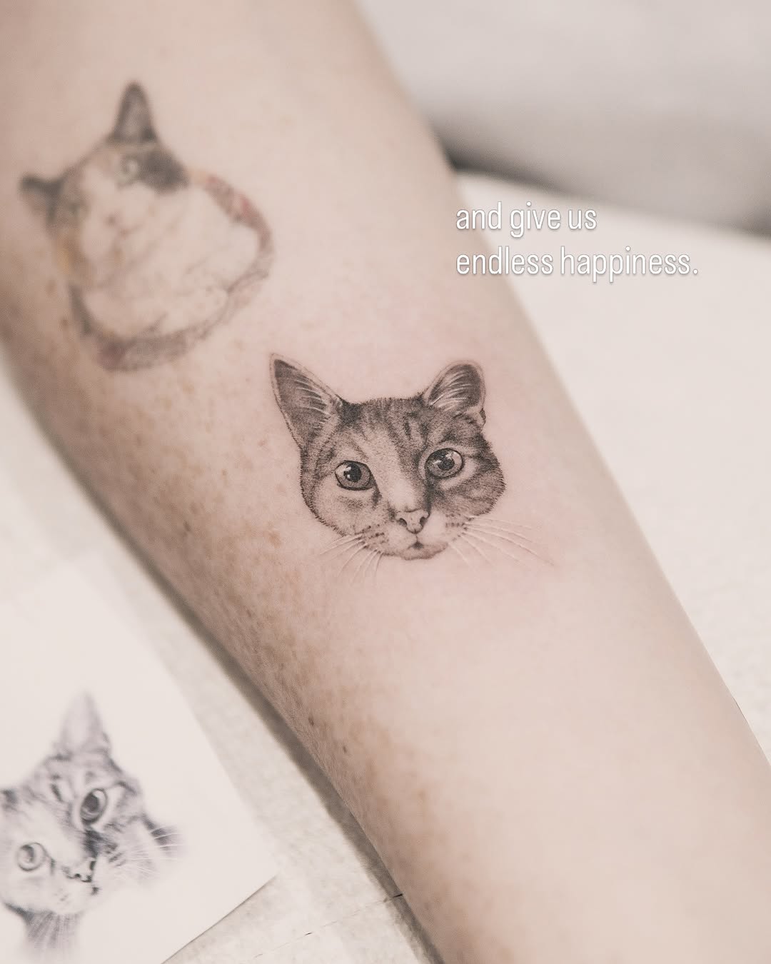 Cat face realism tattoo on the forearm by Joey