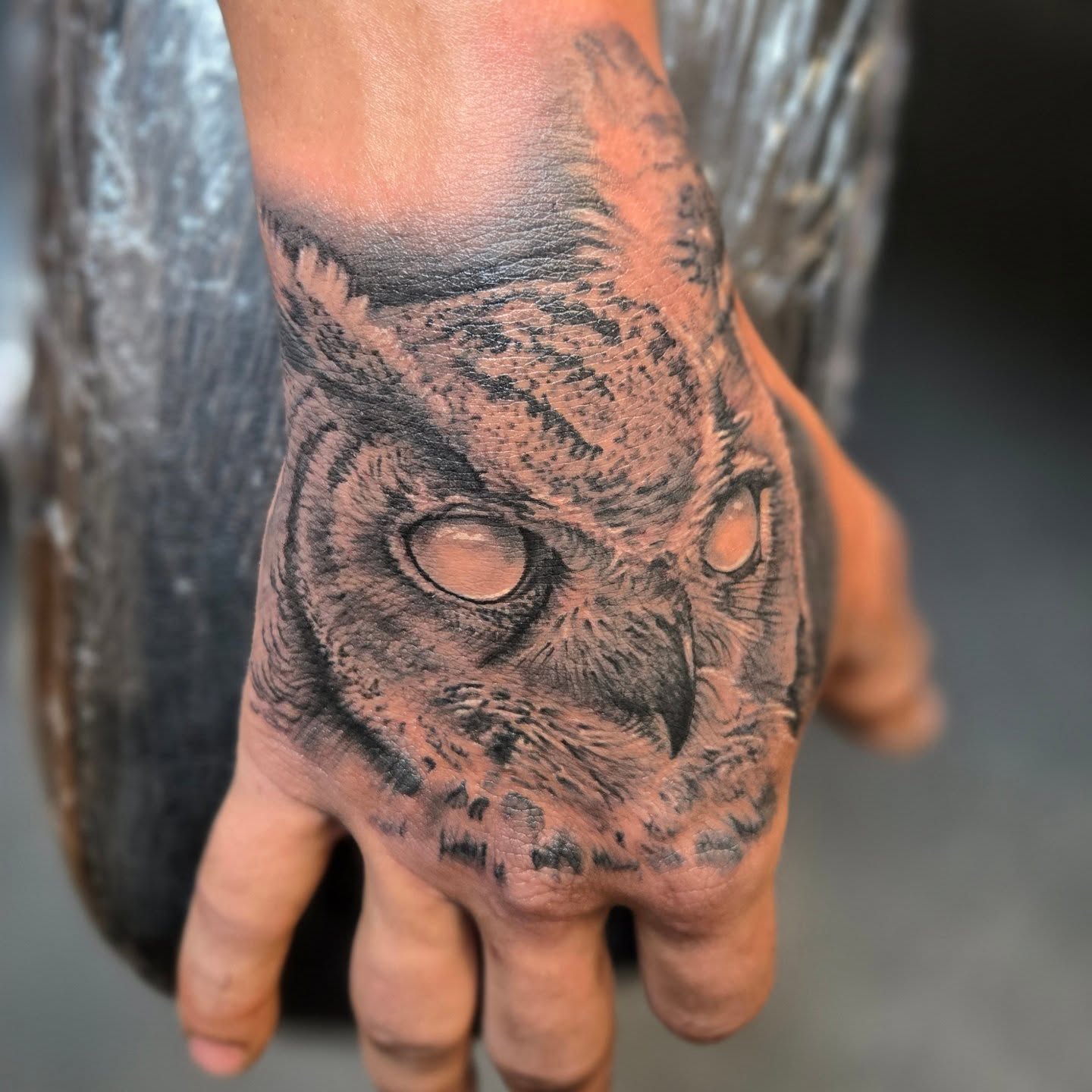 Owl realism tattoo on the hand by Angel O'Connor Tattoos