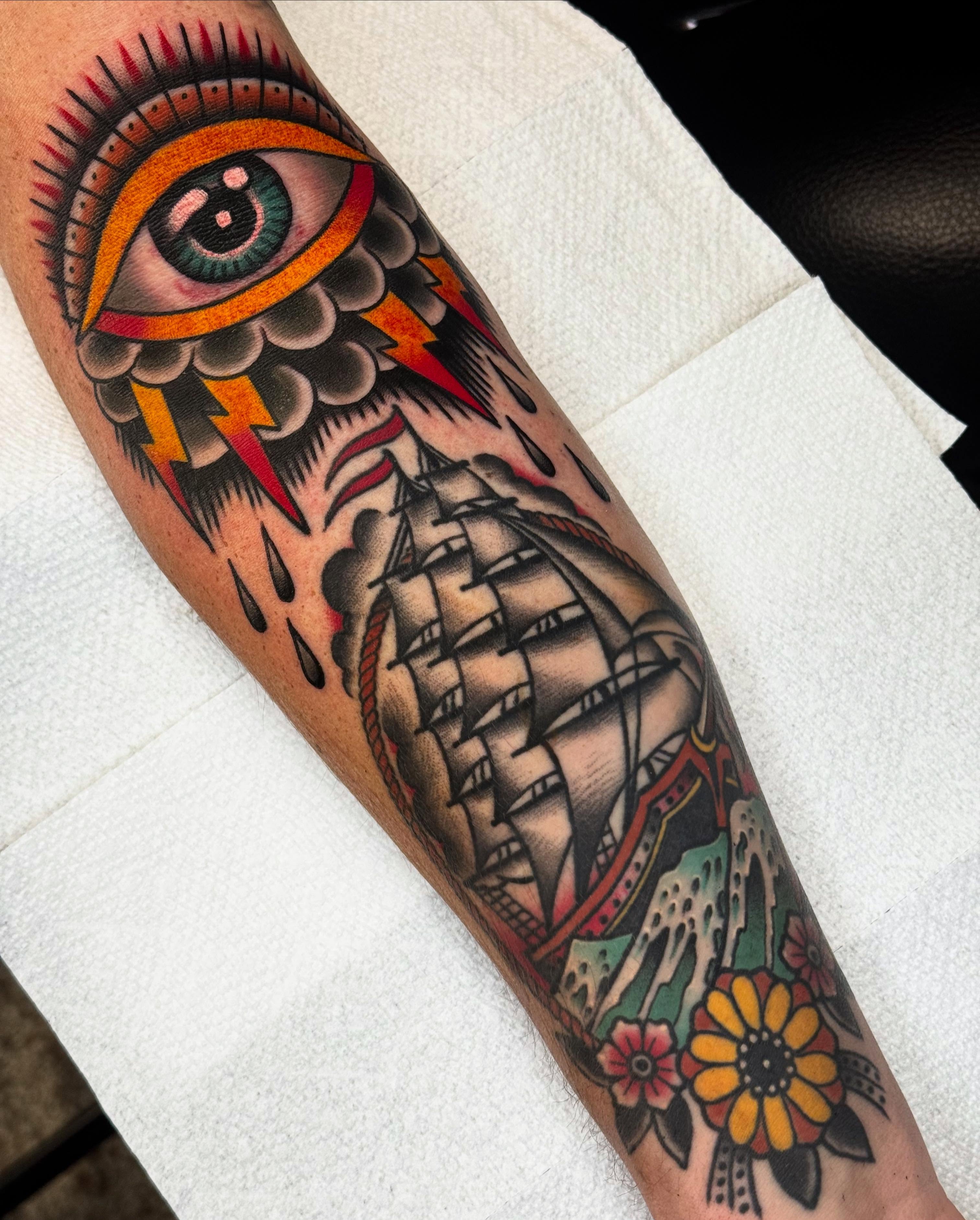 Ship and eye American traditional tattoo on the forearm by Graham Edward Vogel