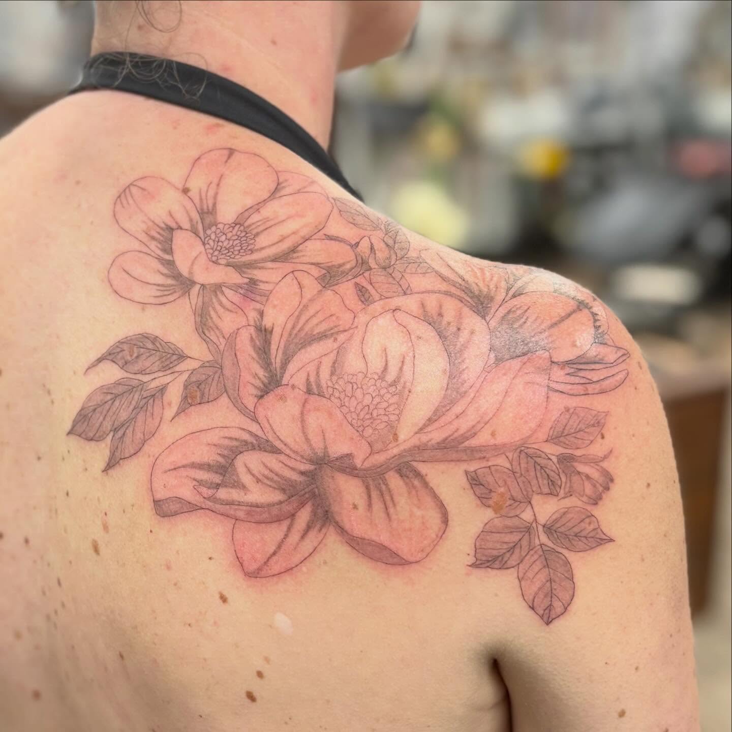 Flower bouquet realism tattoo on the shoulder by bradyn thornton: eco-tattoo artist