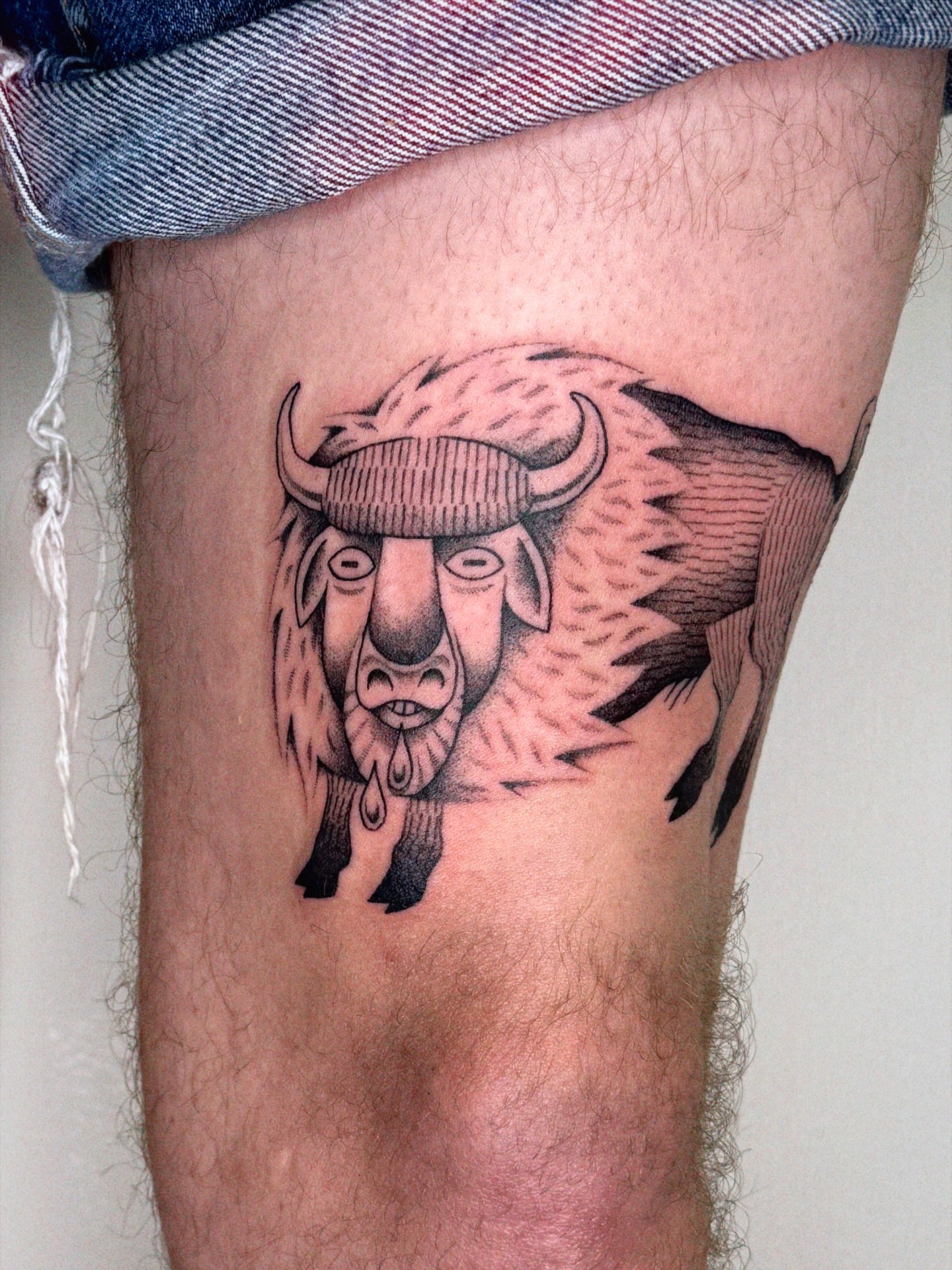 Buffalo black and grey tattoo on the thigh by @inkshame