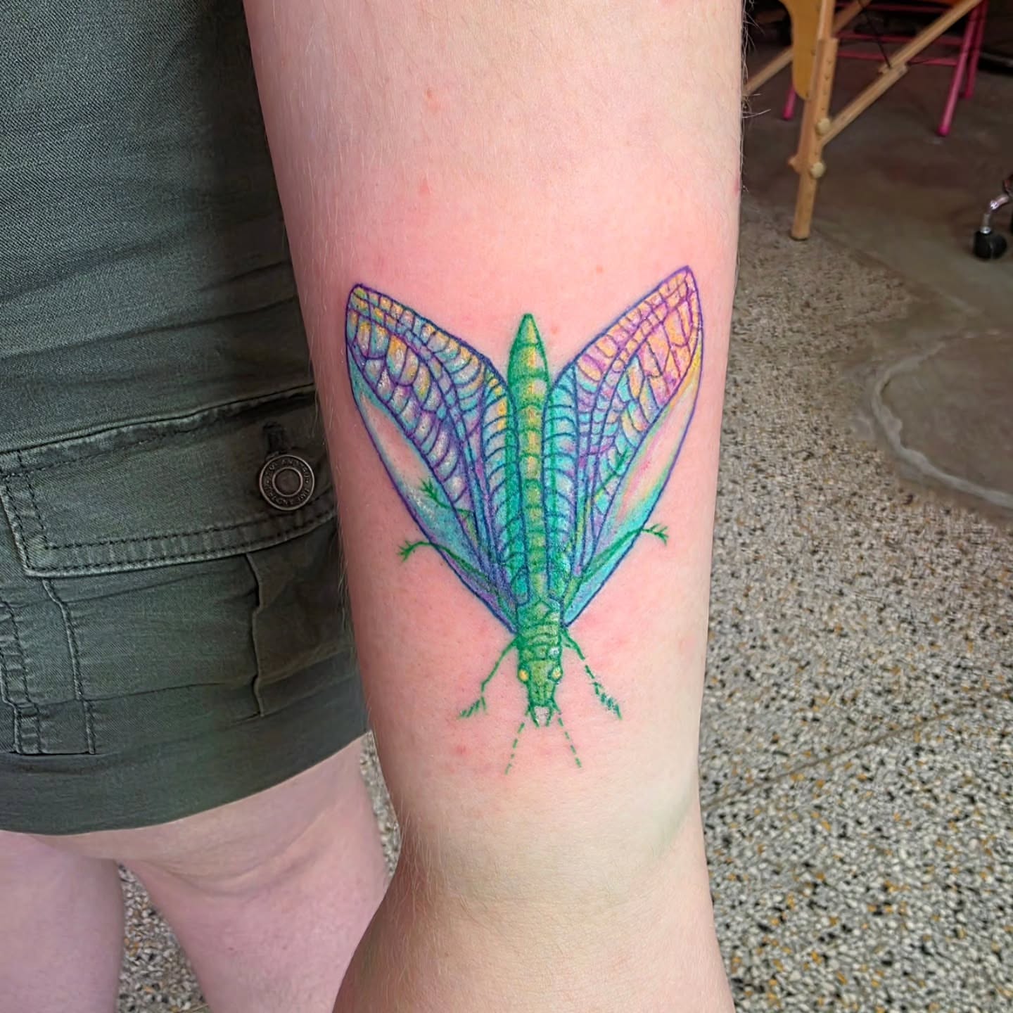 Insect new school tattoo on the forearm by K.F. Golden