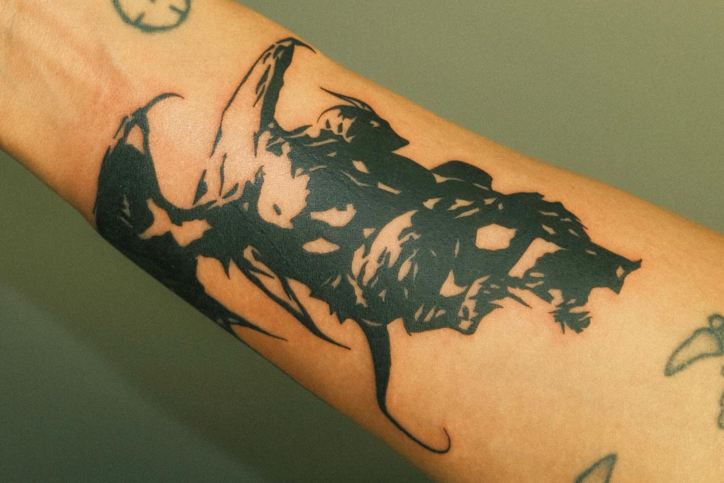 Anime character anime tattoo on the forearm by Thiên Hồ