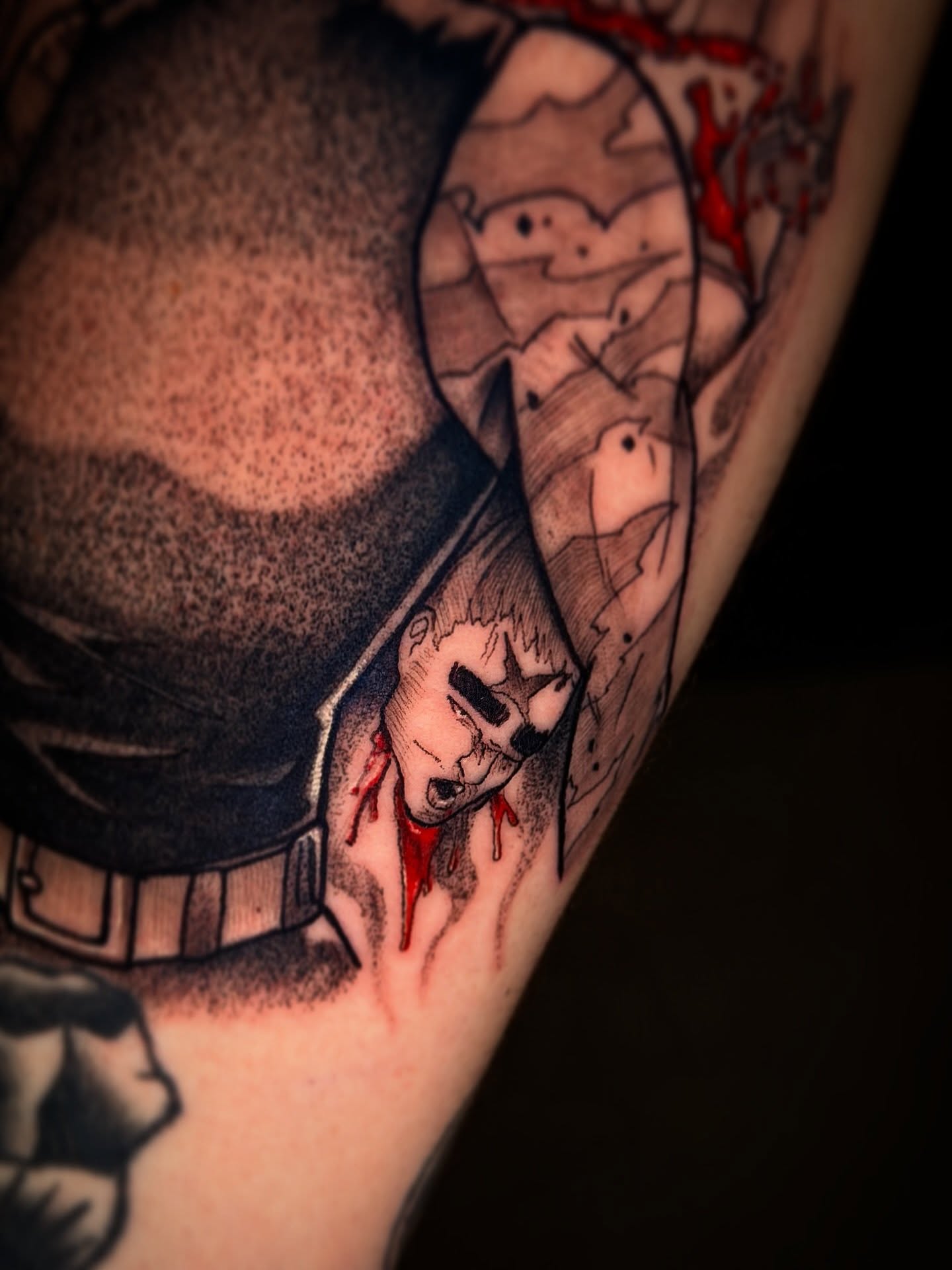 Man with mask dotwork tattoo on the shoulder by Aiden Madrigal