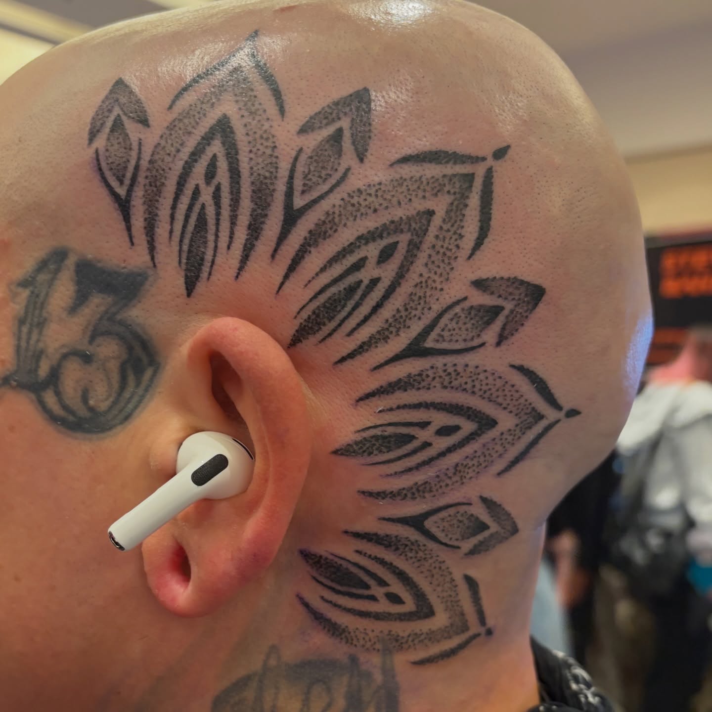 Tattoo by @theblackdottattoo — dotwork, tribal
