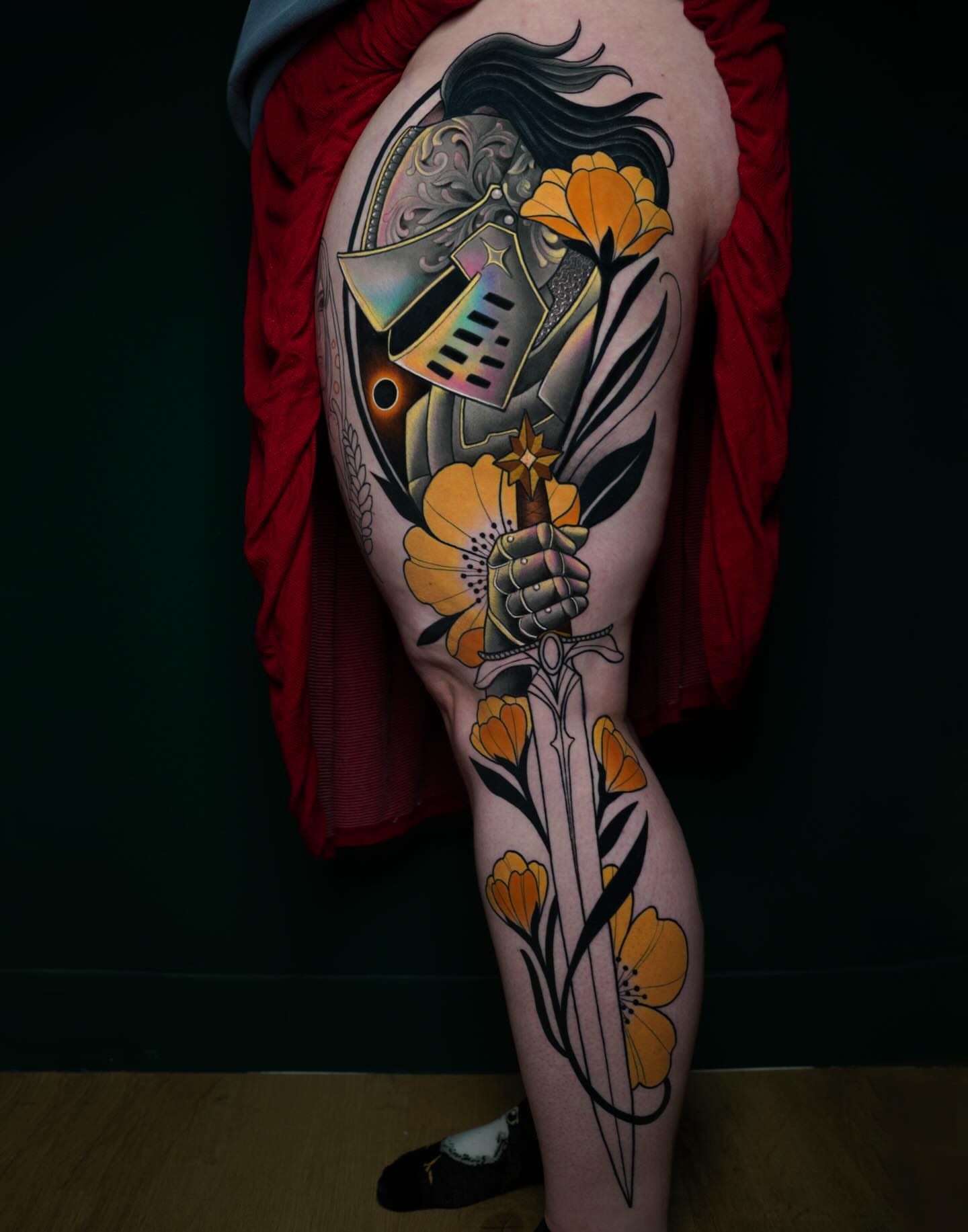 Floral warrior American traditional tattoo on the thigh by Brooke Borden