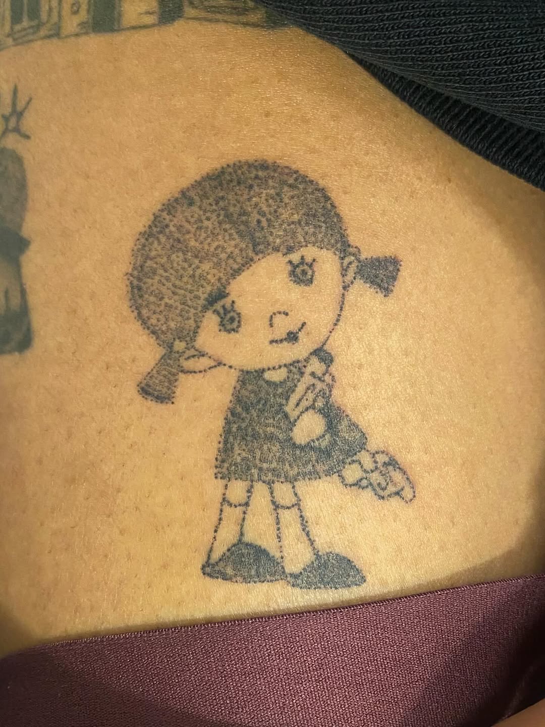 Cartoon girl ignorant tattoo on the thigh by @feverfeverish