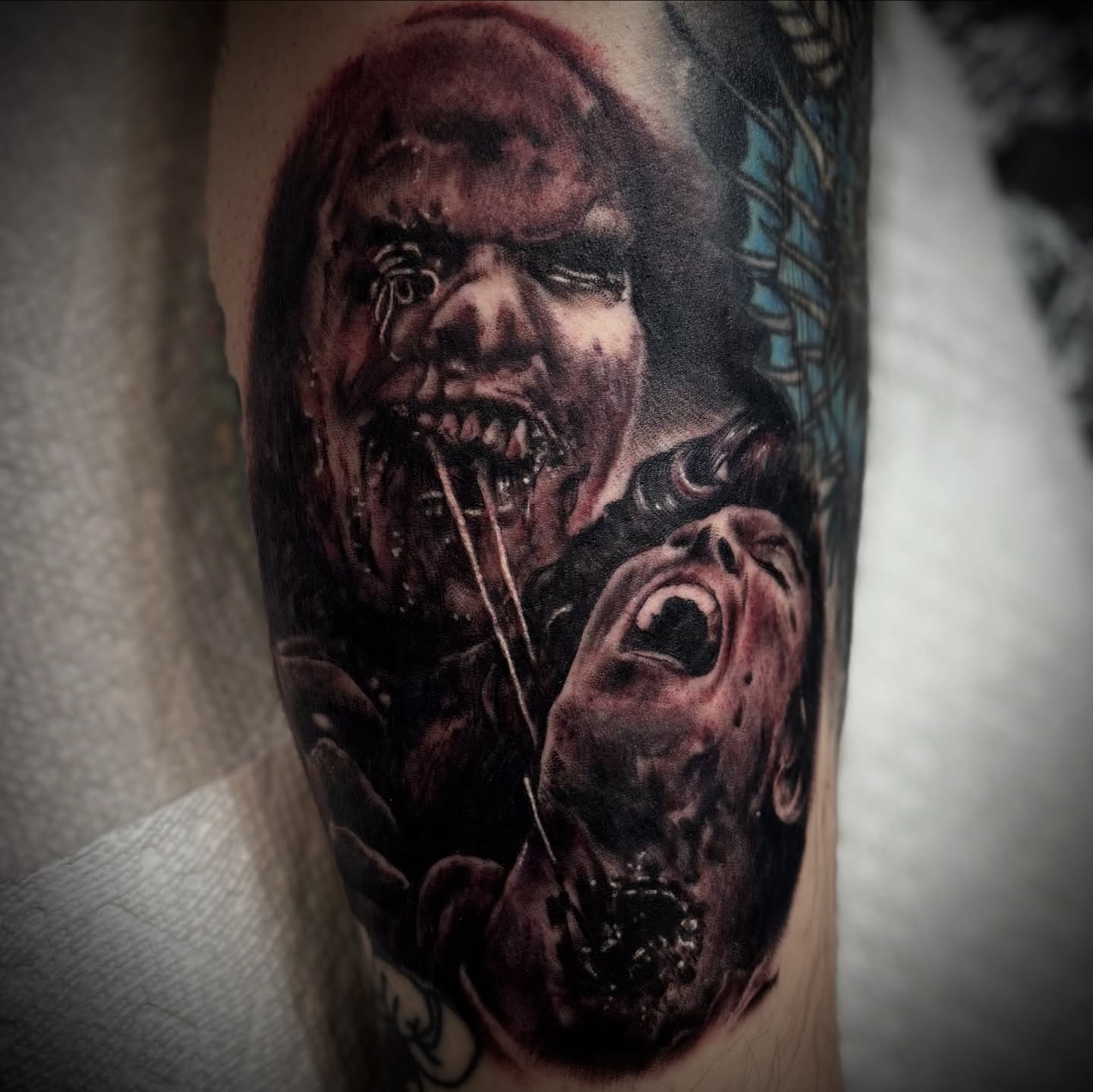 Zombie heads dark realism tattoo on the forearm by Ty East