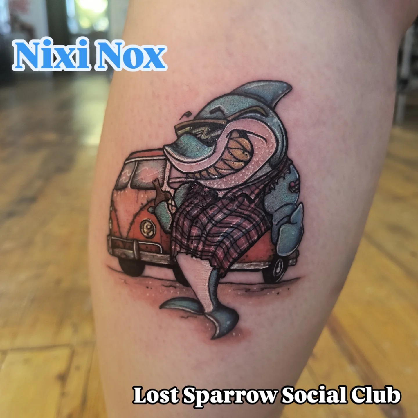 Shark wearing plaid shirt realism tattoo on the thigh by Niki Jackson