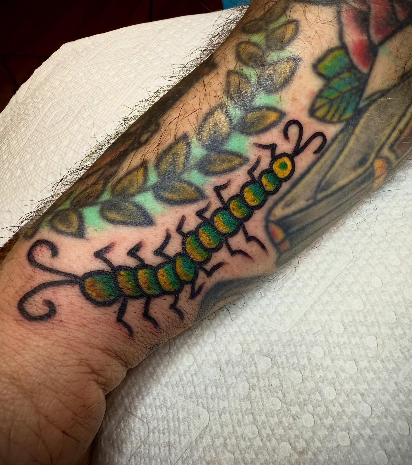 Centipede American traditional tattoo on the forearm by Victoria Lagano NYC Traditional Tattoos