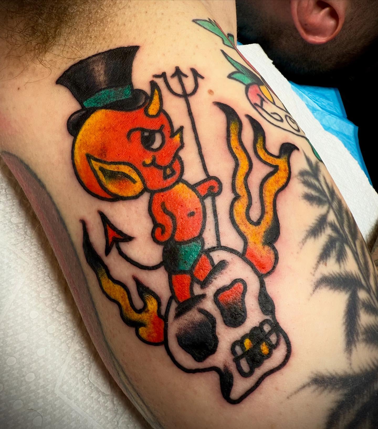 Devil with trident American traditional tattoo on the shoulder by Victoria Lagano NYC Traditional Tattoos