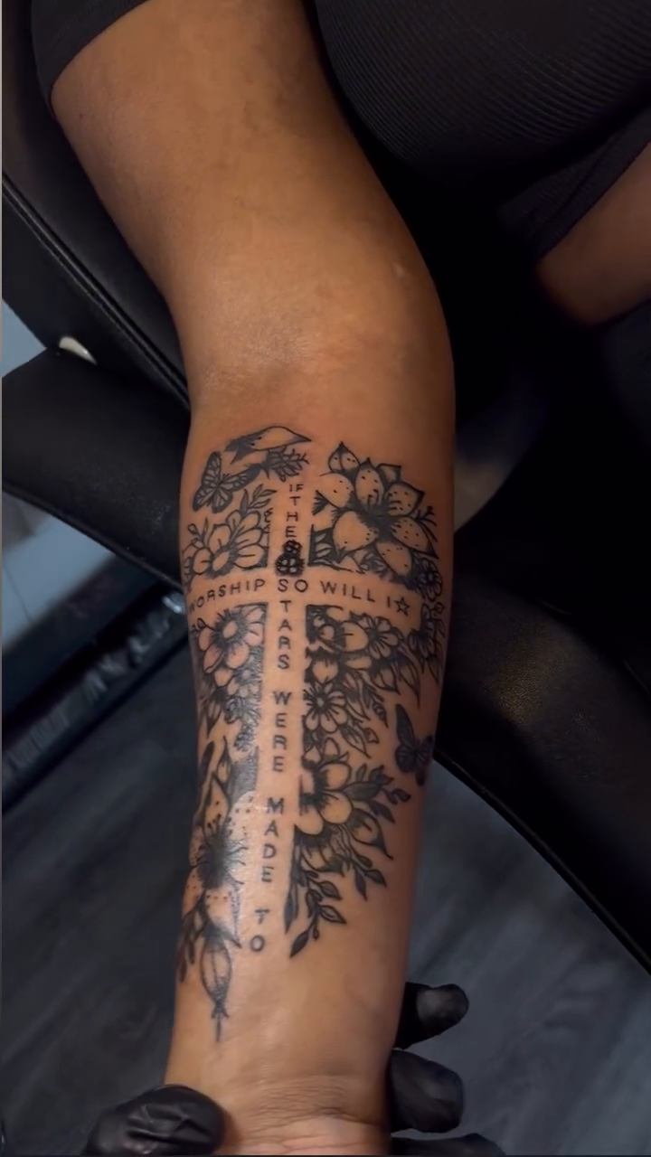 Cross with floral elements and lettering ornamental tattoo on the leg by Dm To Book ๐, Charlotte, North Carolina