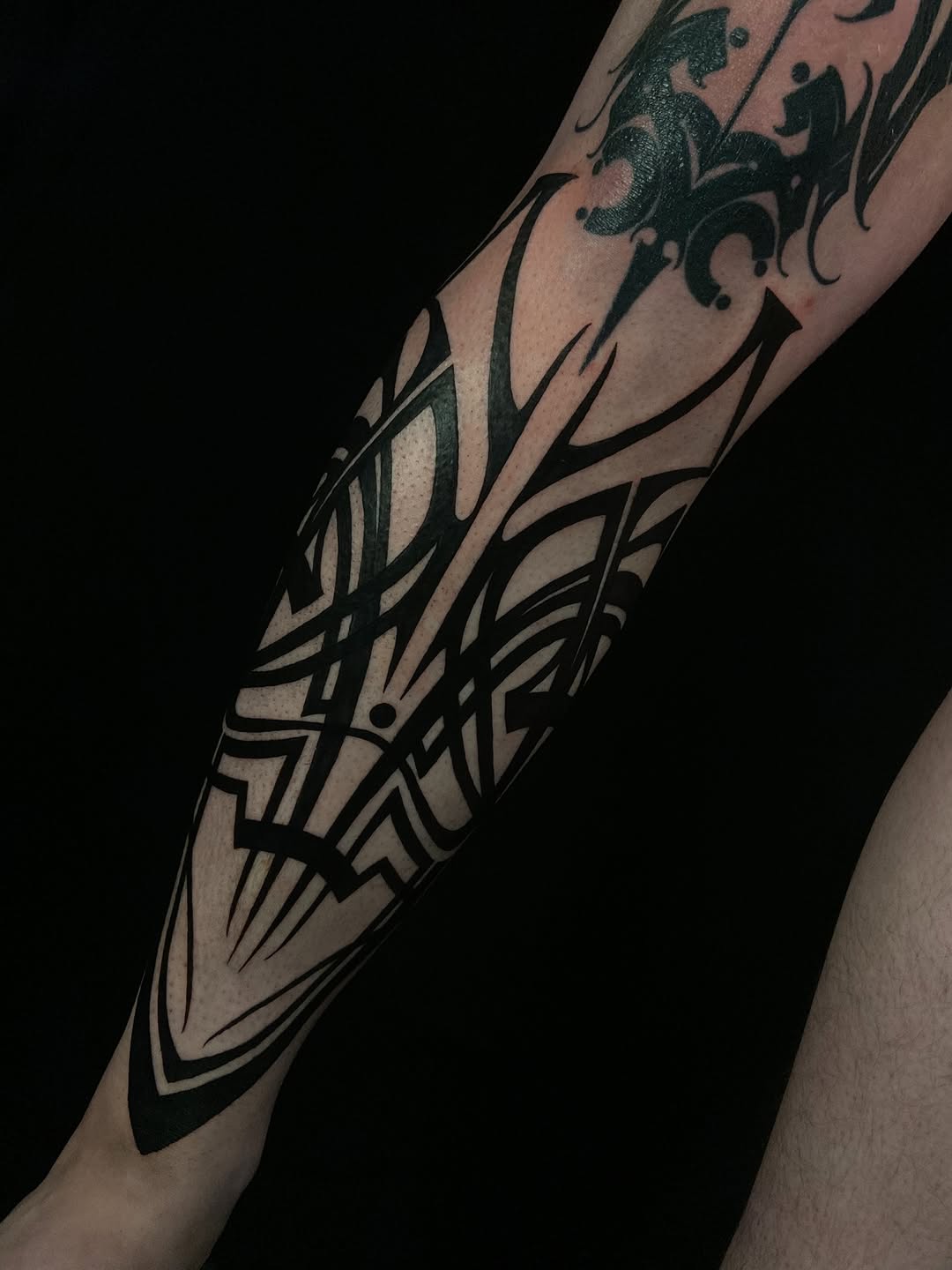Tattoo by @baptism_black โ tribal, blackwork