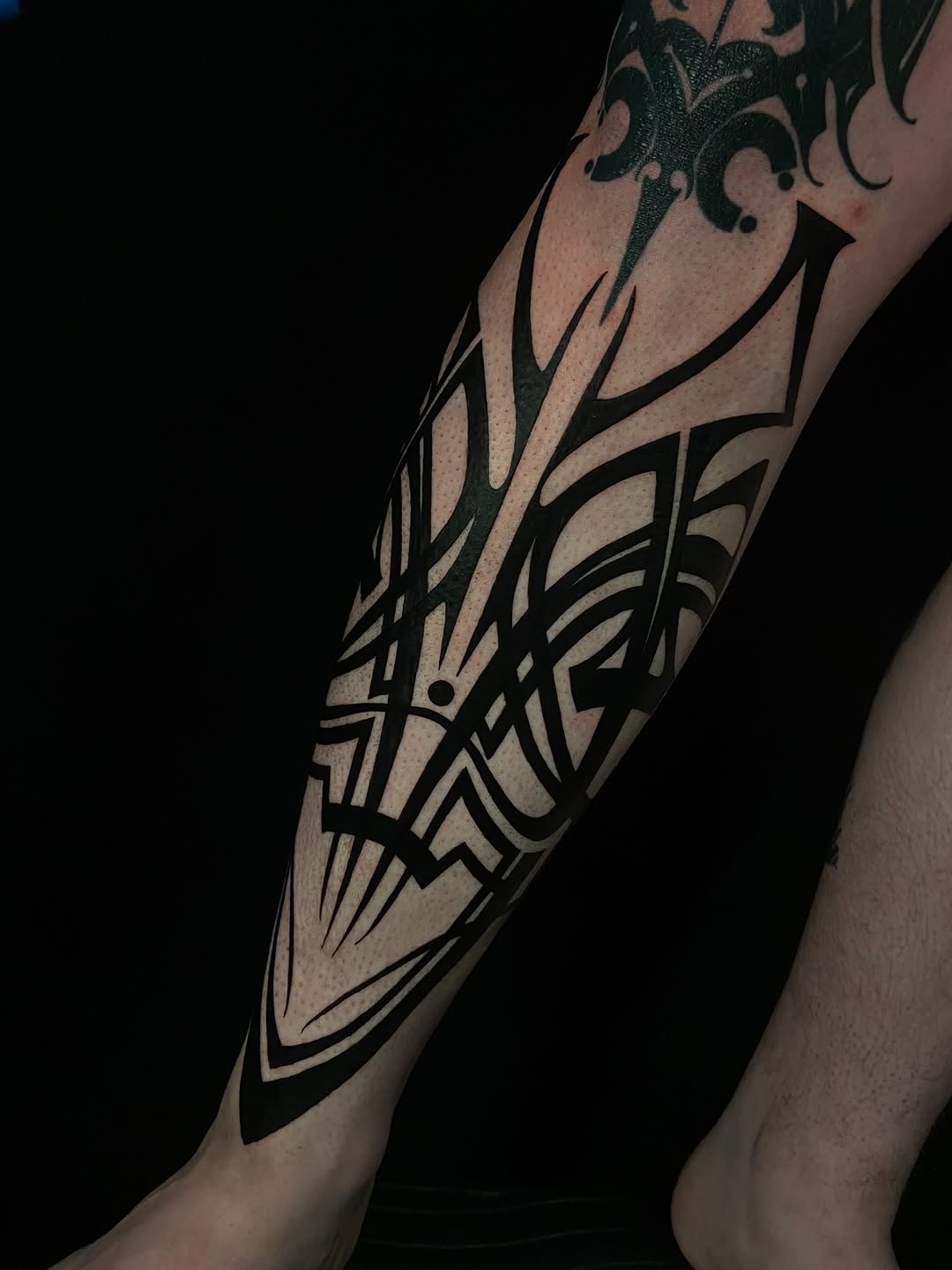 Tattoo by @baptism_black โ tribal, blackwork