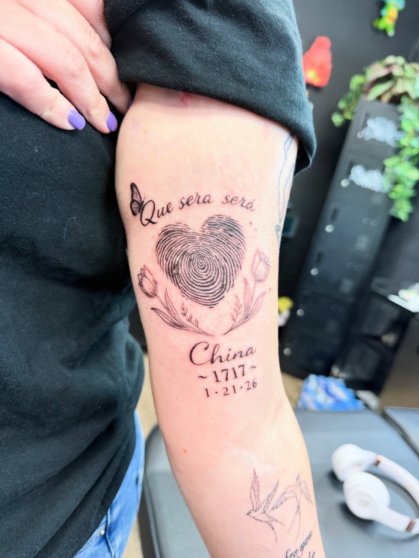 Fingerprint heart dotwork tattoo on the forearm by Chris