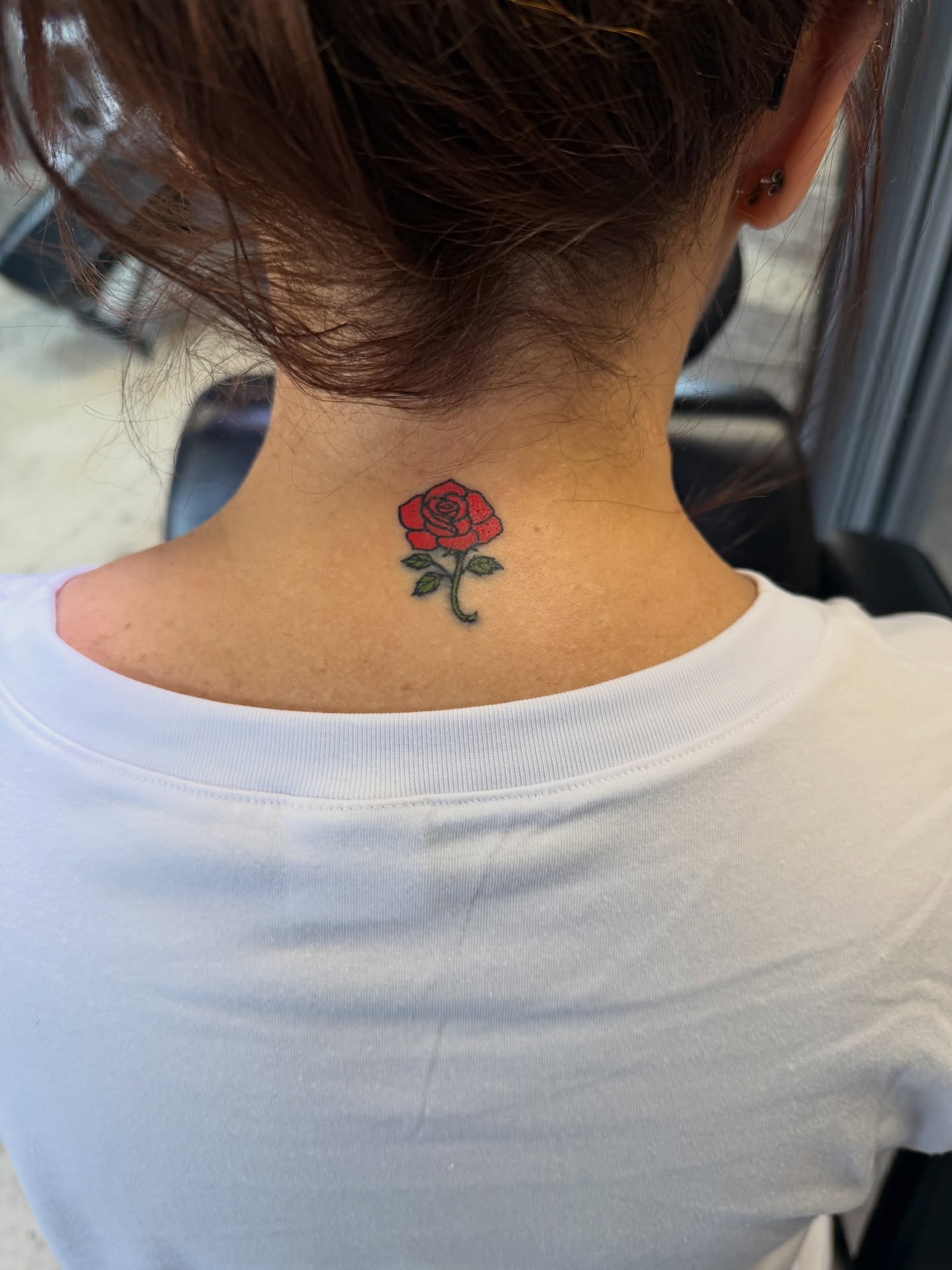Red rose dotwork tattoo on the back by Raciel Fabian Romero